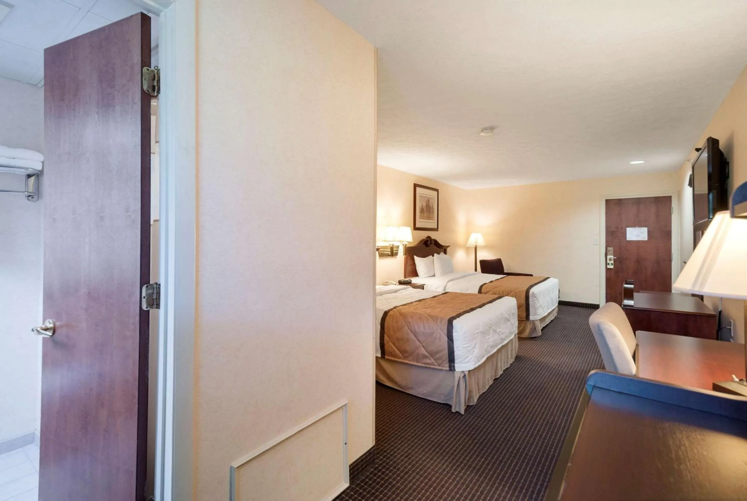 Queen Room with Two Queen Beds - Non-Smoking in Rodeway Inn & Suites