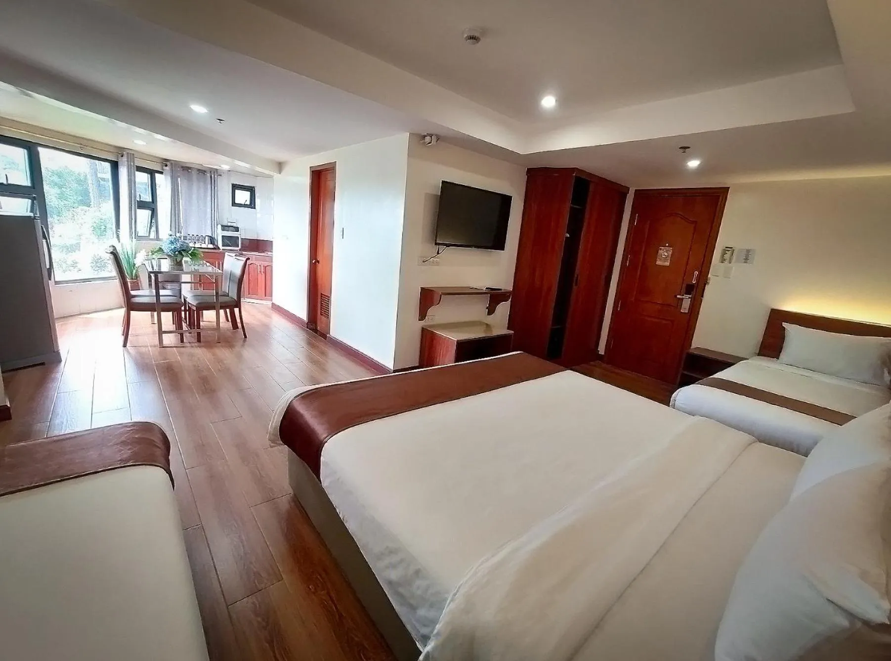 Room 105 Family Quad Room with City View in 456 Hotel