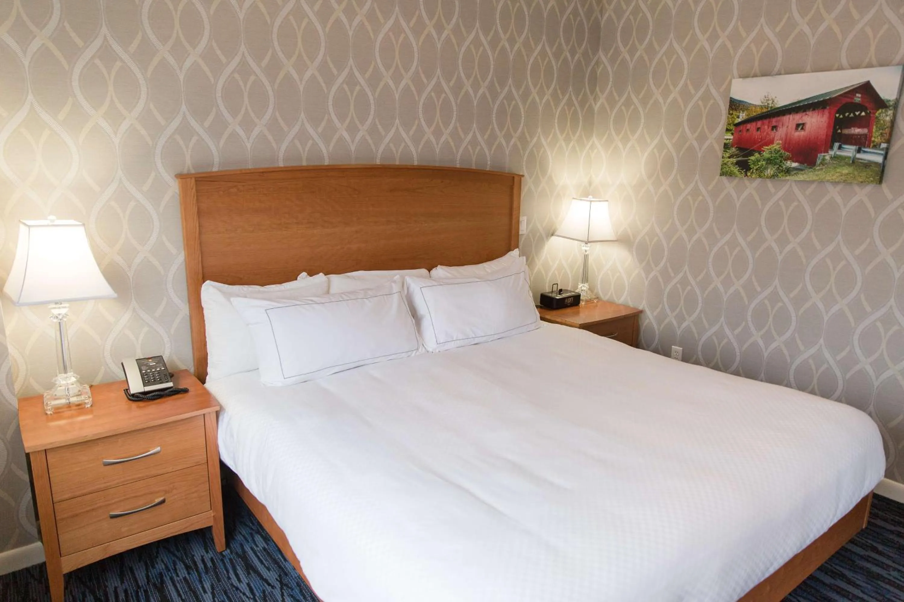 One-Bedroom Corner King Suite with Sofa Bed in Capitol Plaza Hotel Montpelier Tapestry Collection by Hilton