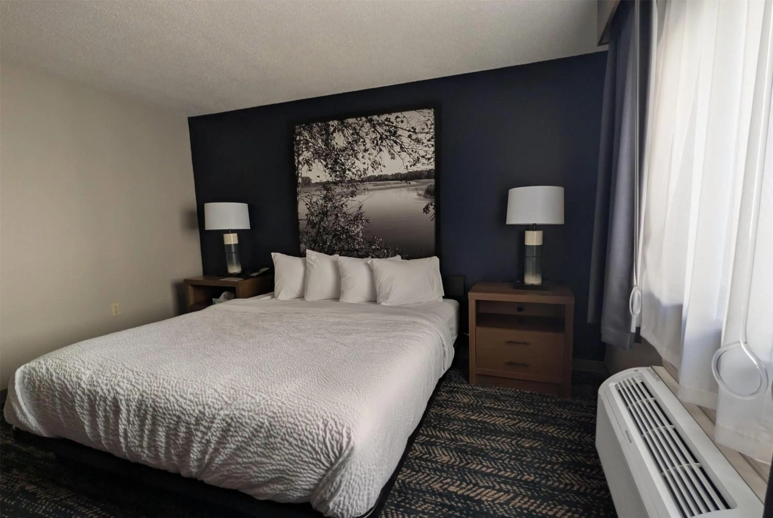 King Room with One King Bed and Bathtub with Grab Bars - Accessible - Non-Smoking in Super 8 by Wyndham Perham