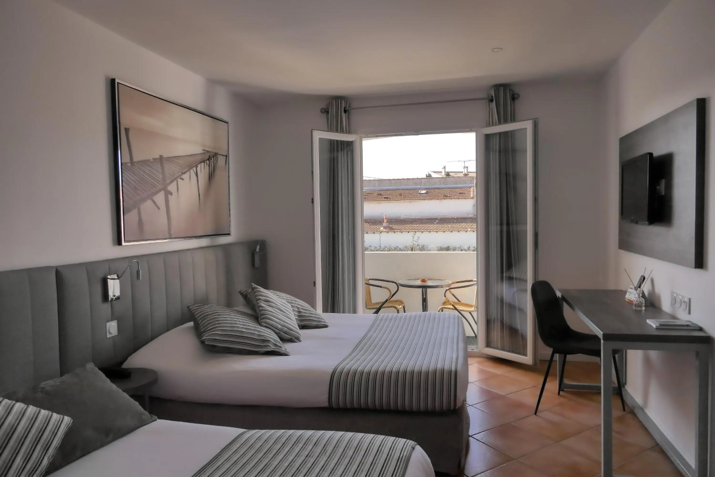 Quadruple Room with Garden View in Logis Hôtel Le Rodin