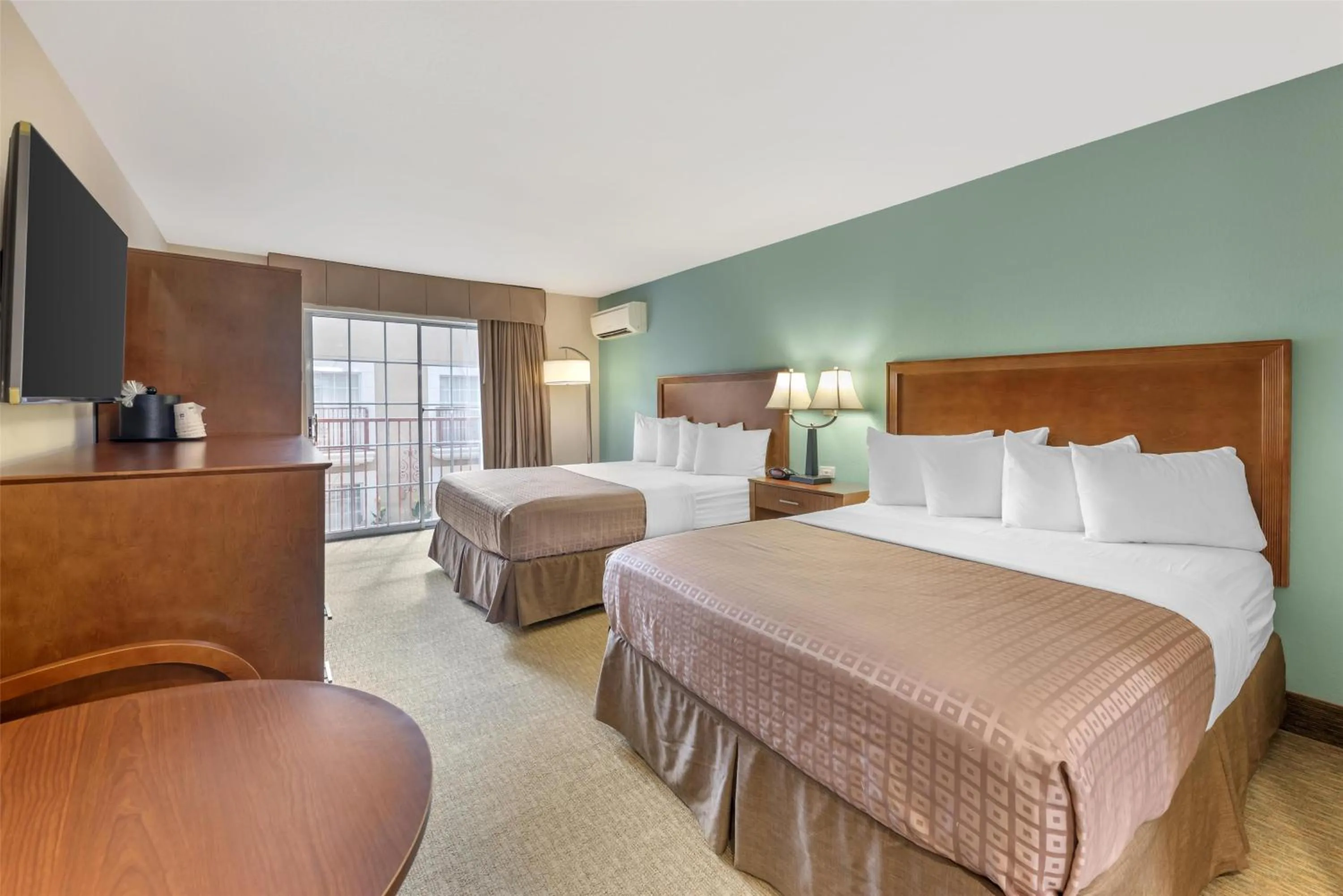 Queen Room with Two Queen Beds - Pool View - Nonsmoking in Best Western Plus Atrium Inn
