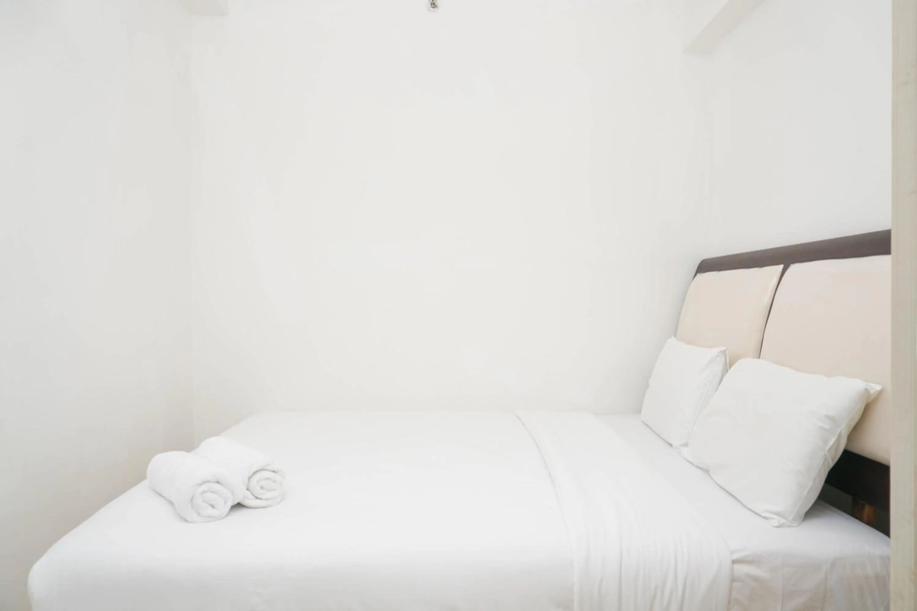 Spacious 2BR Green Bay Pluit Apartment By Travelio