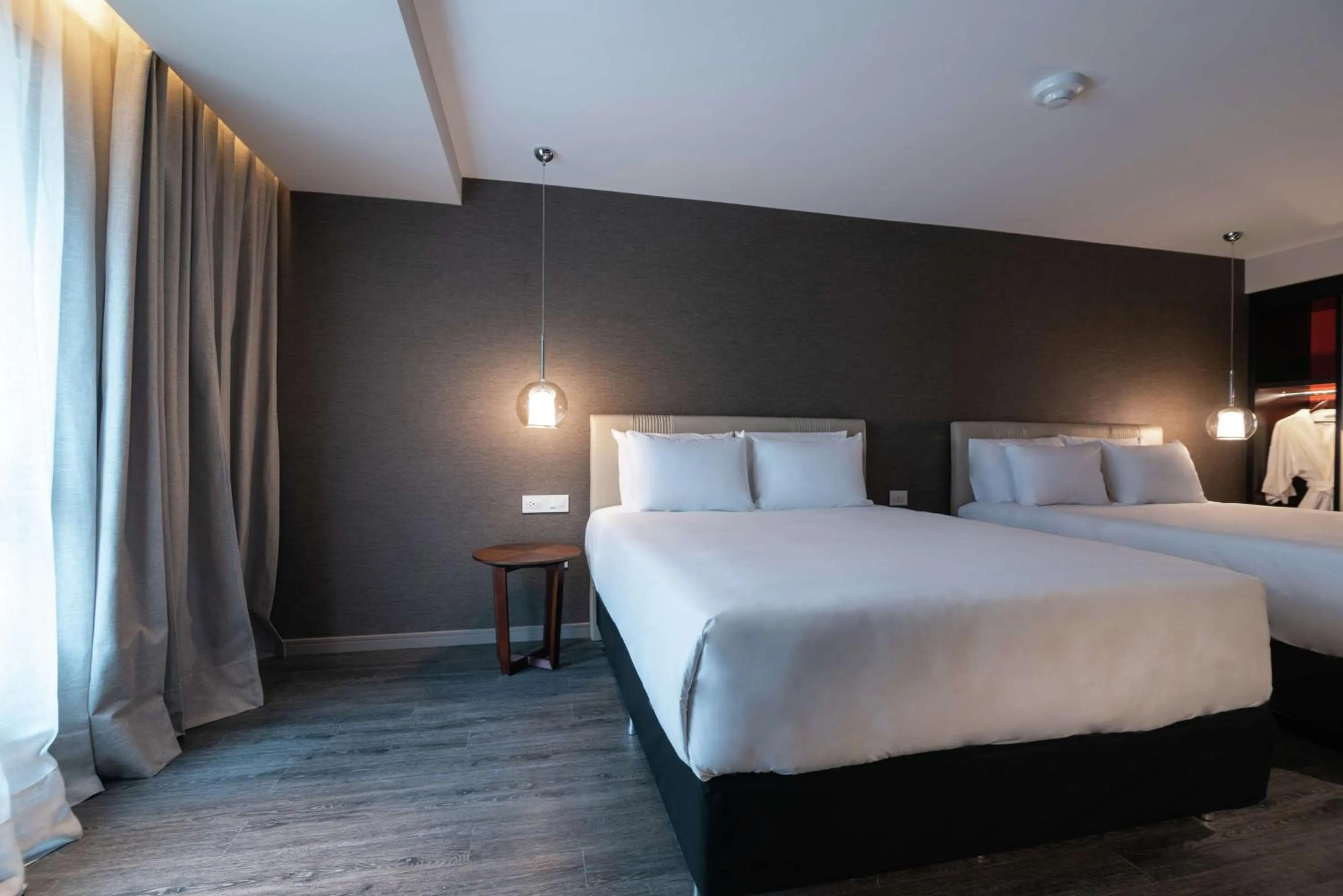 Queen Room with Two Queen Beds and Roll-In Shower - Mobility and Hearing Access in Soro Montevideo, Curio Collection By Hilton