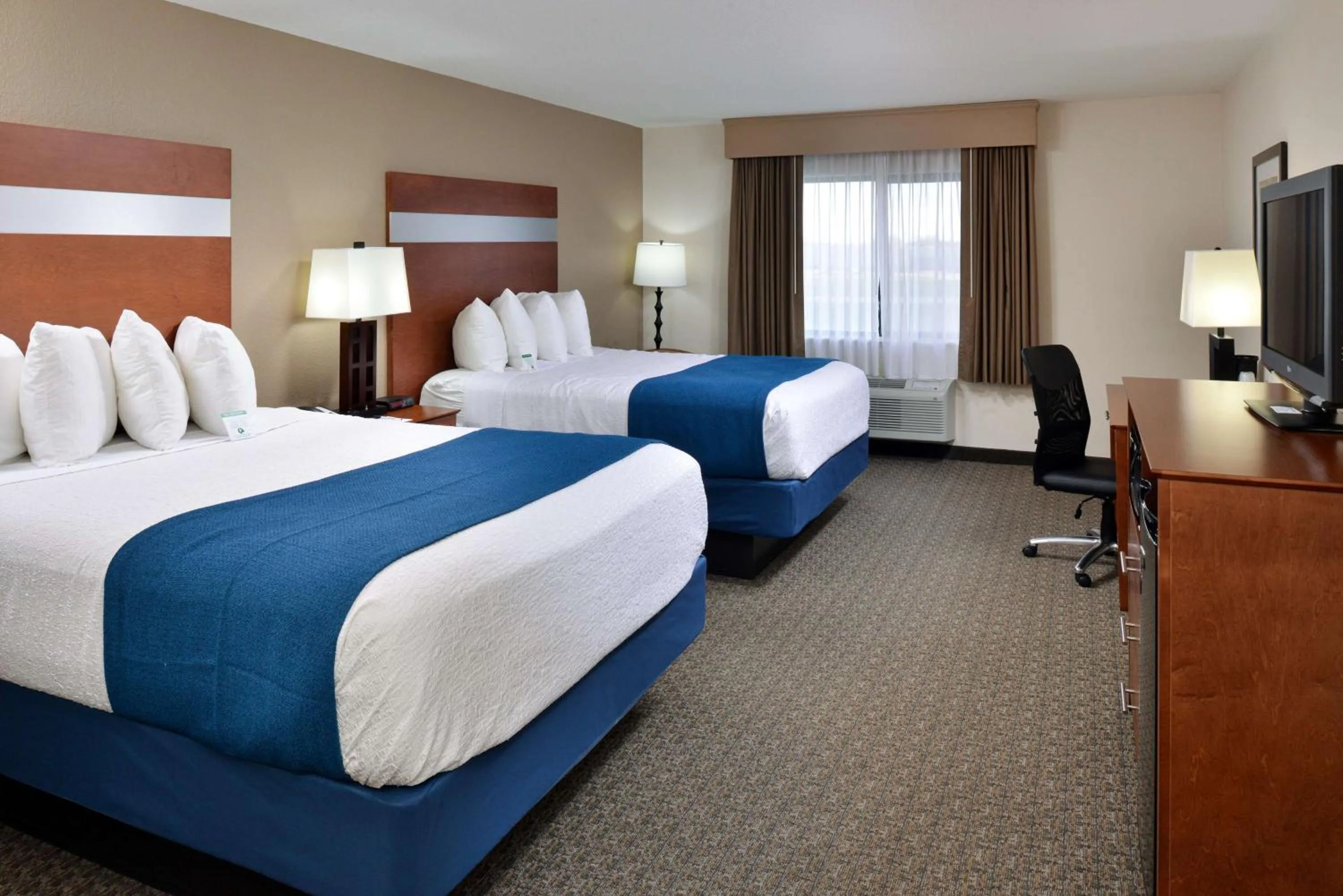 Queen Room with Two Queen Beds and Roll-In Shower - Mobility Accessible in Best Western Big Spring Lodge