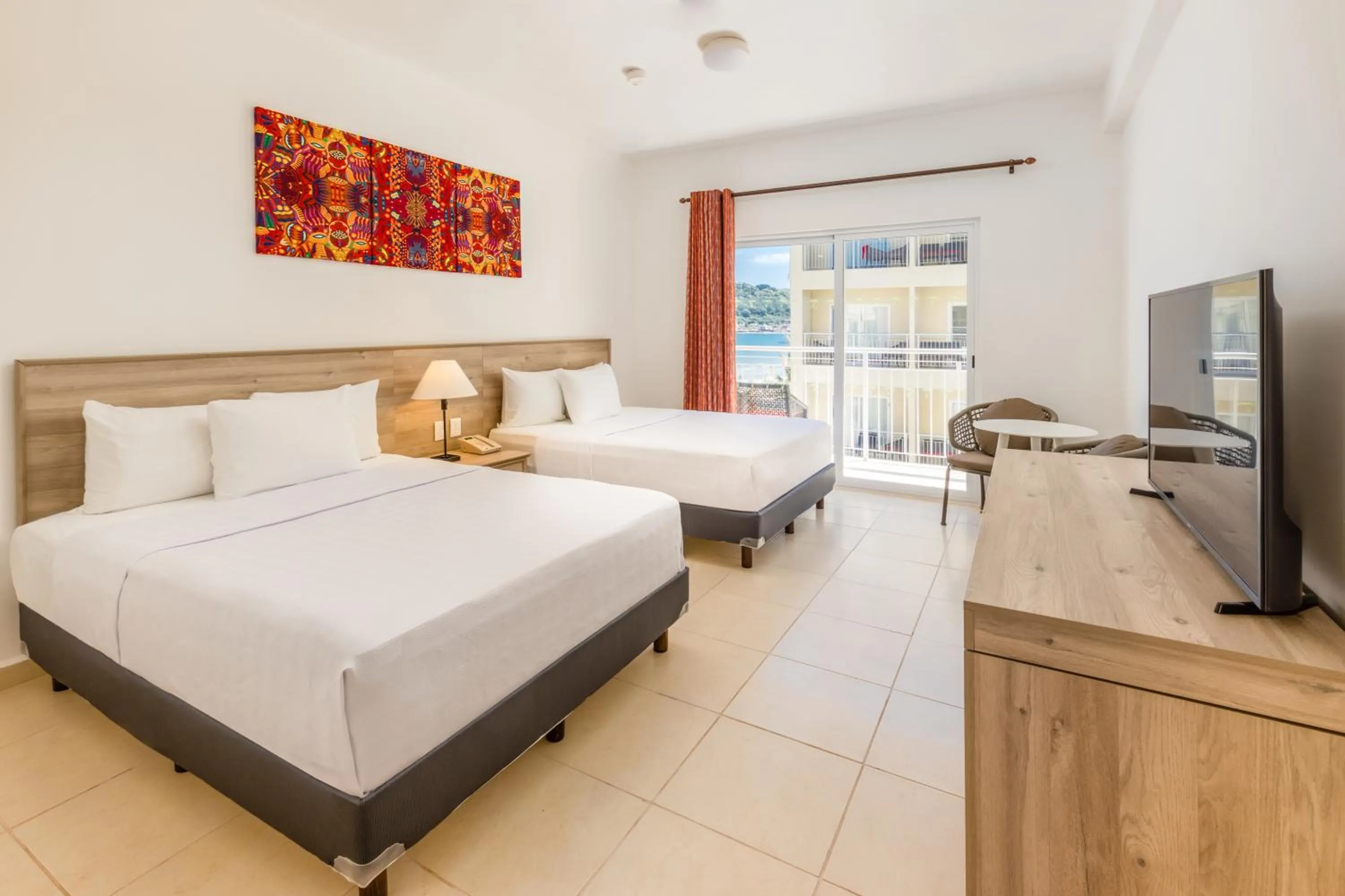 Ocean view 2 Queen Beds - single occupancy in Decameron Isla Coral Guayabitos, Ramada All-Inclusive Resort
