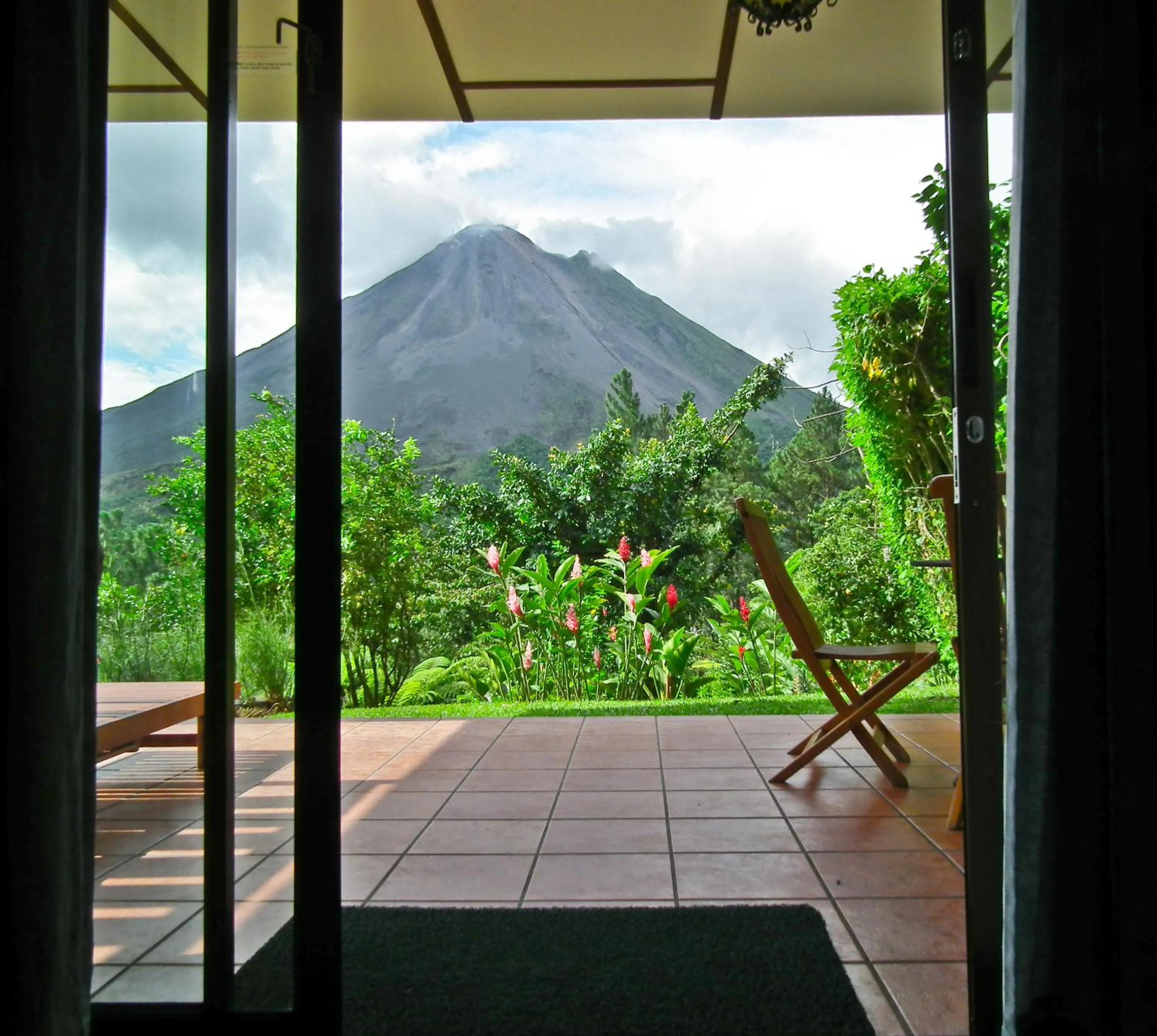 Smithsonian Room + Waterfall in Arenal Observatory Lodge & Trails