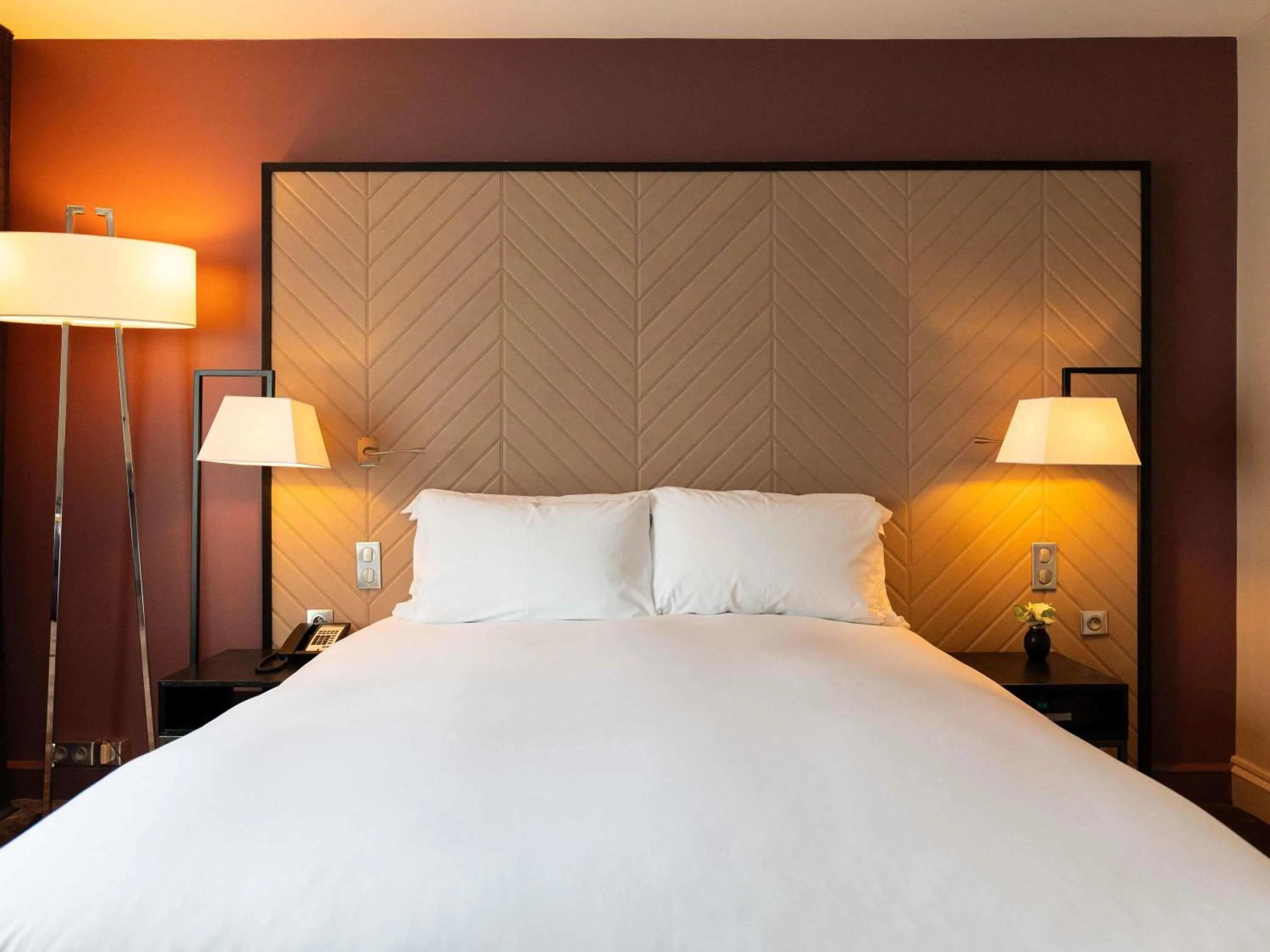 Family Room with a Queen Bed and Two Single Beds in Sofitel Strasbourg Grande Ile