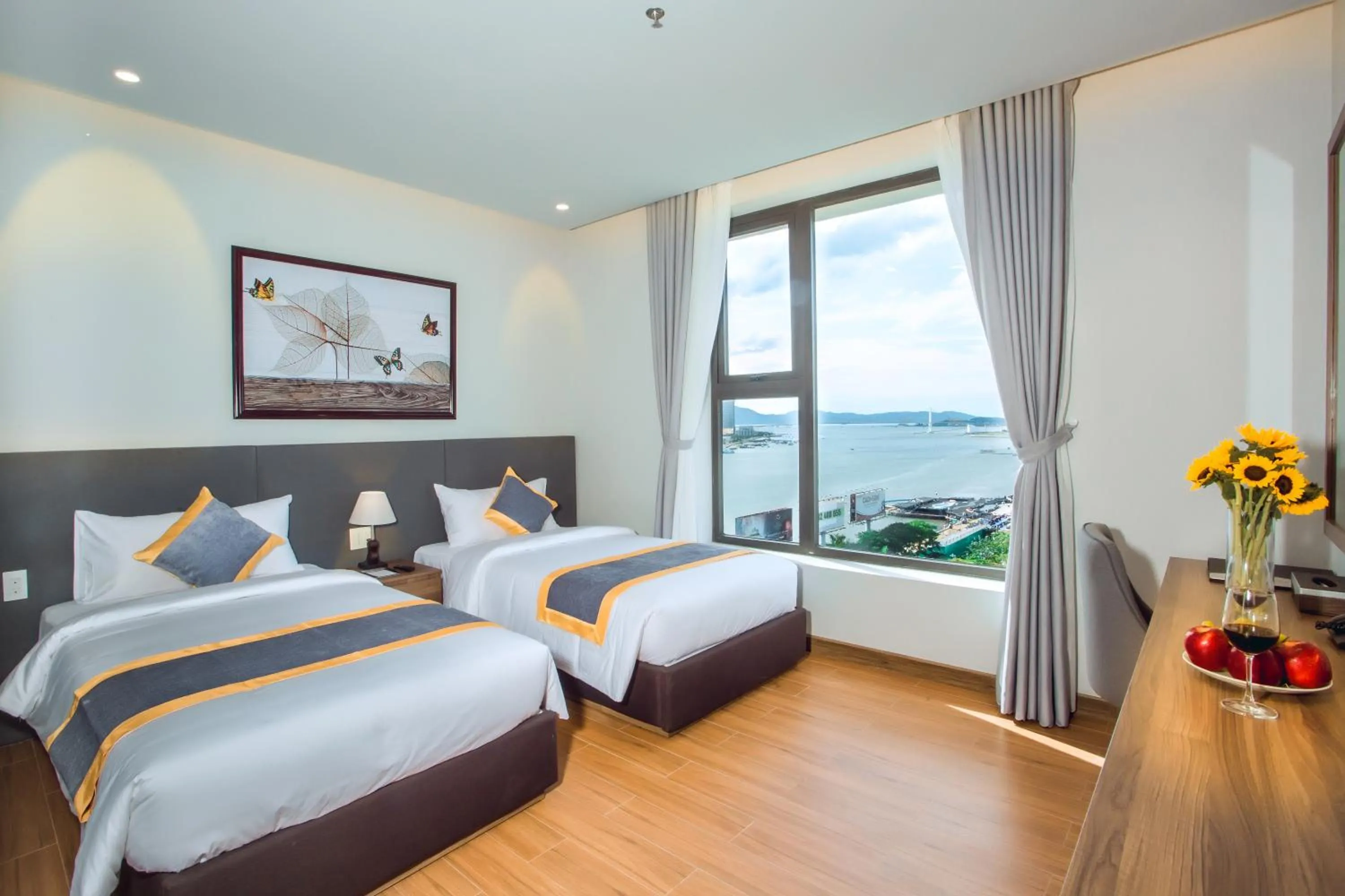 Family Room with Partial River View in Glamour Hotel Da Nang