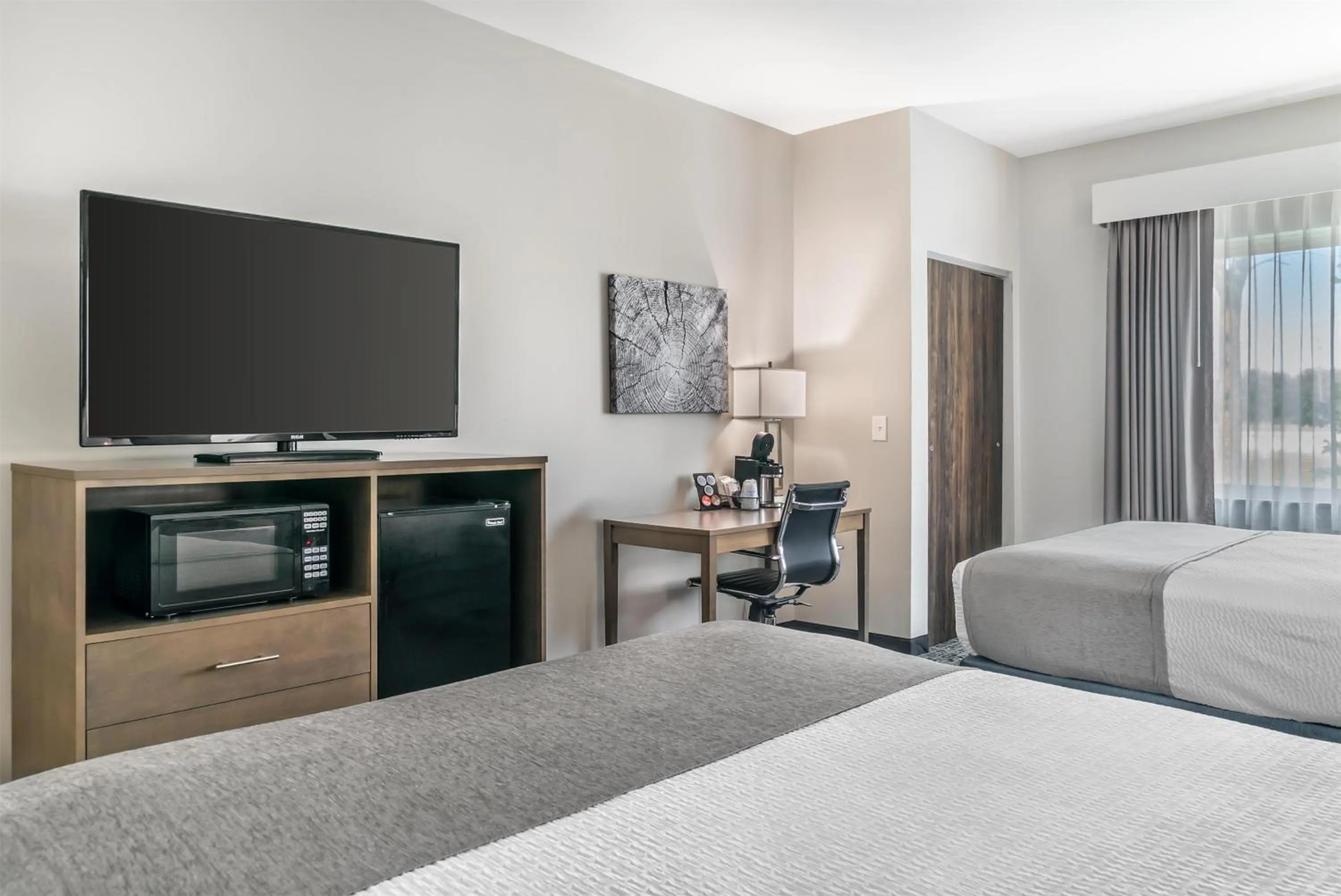 Queen Room with Two Queen Beds and Mobility Accessible Roll-In Shower in Best Western Plus Wayland Hotel