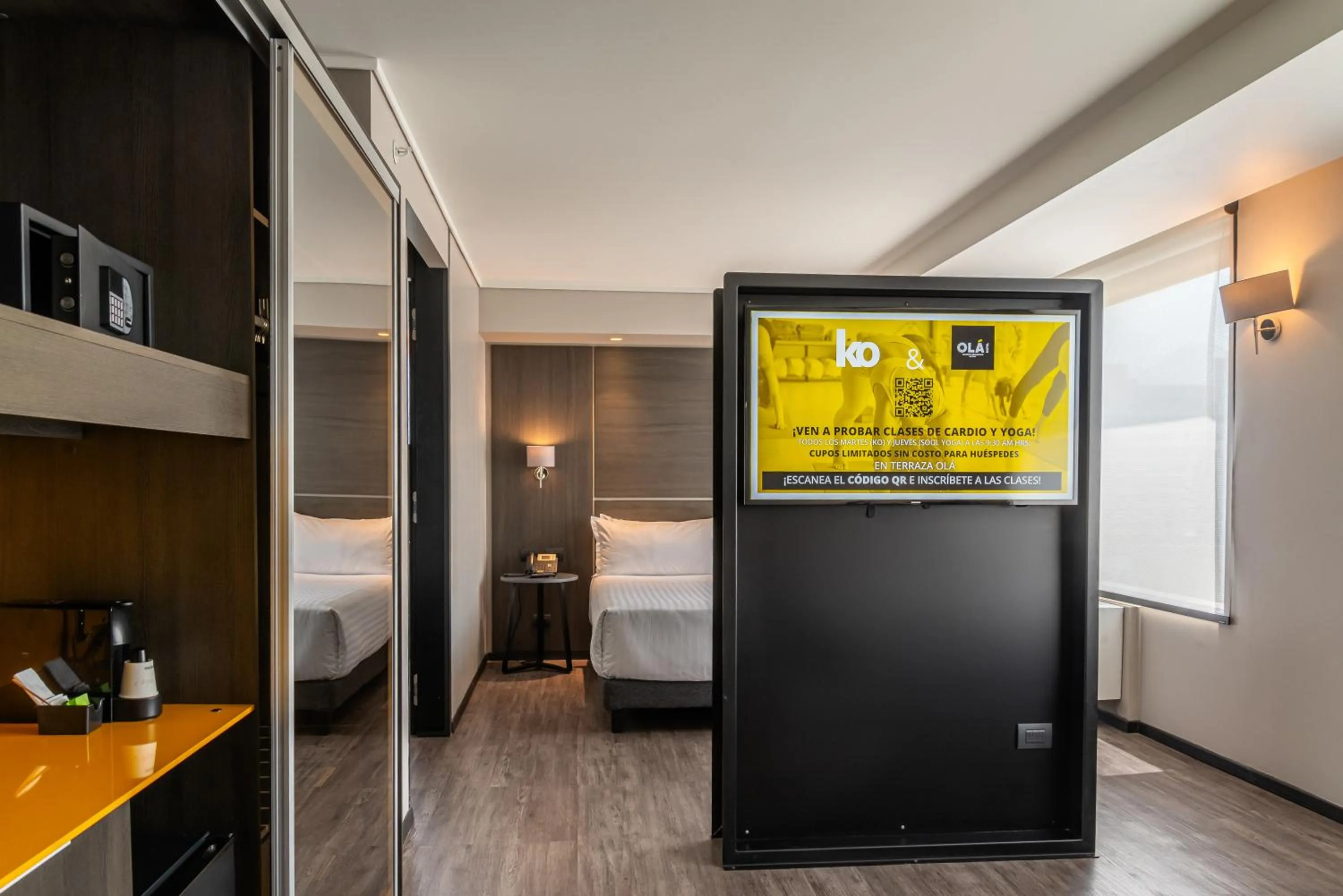 Junior King Suite with Sofa Bed in Ola Santiago Providencia, Tapestry Collection by Hilton