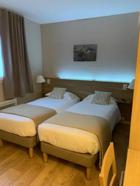 Twin Room with Courtyard View - single occupancy in Logis Hôtel Restaurant Du Lion D'argent Et Des Tanneries