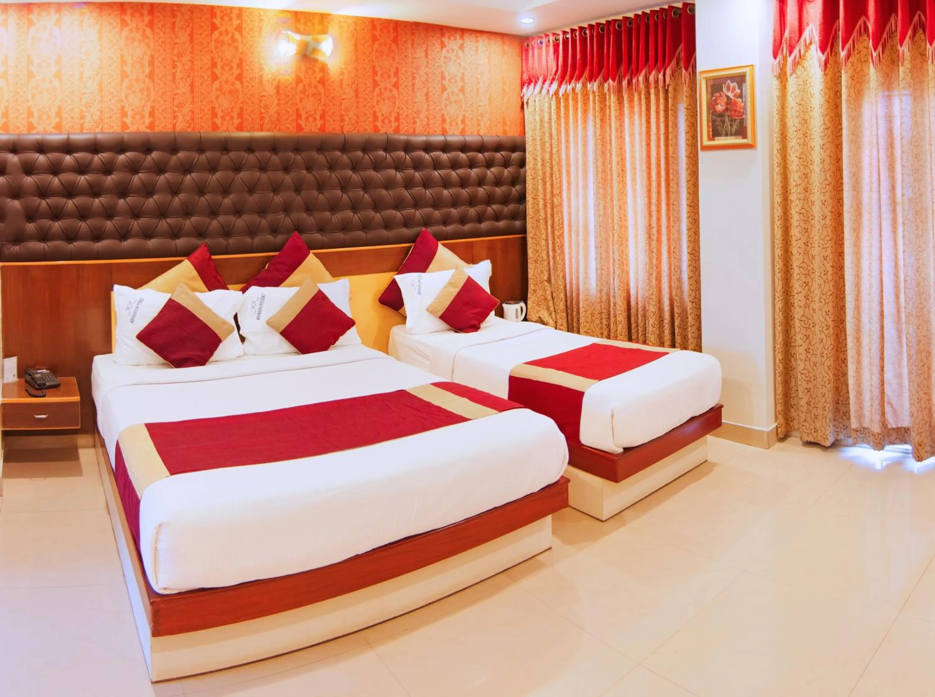 Superior Triple Room in Aishwarya Residency