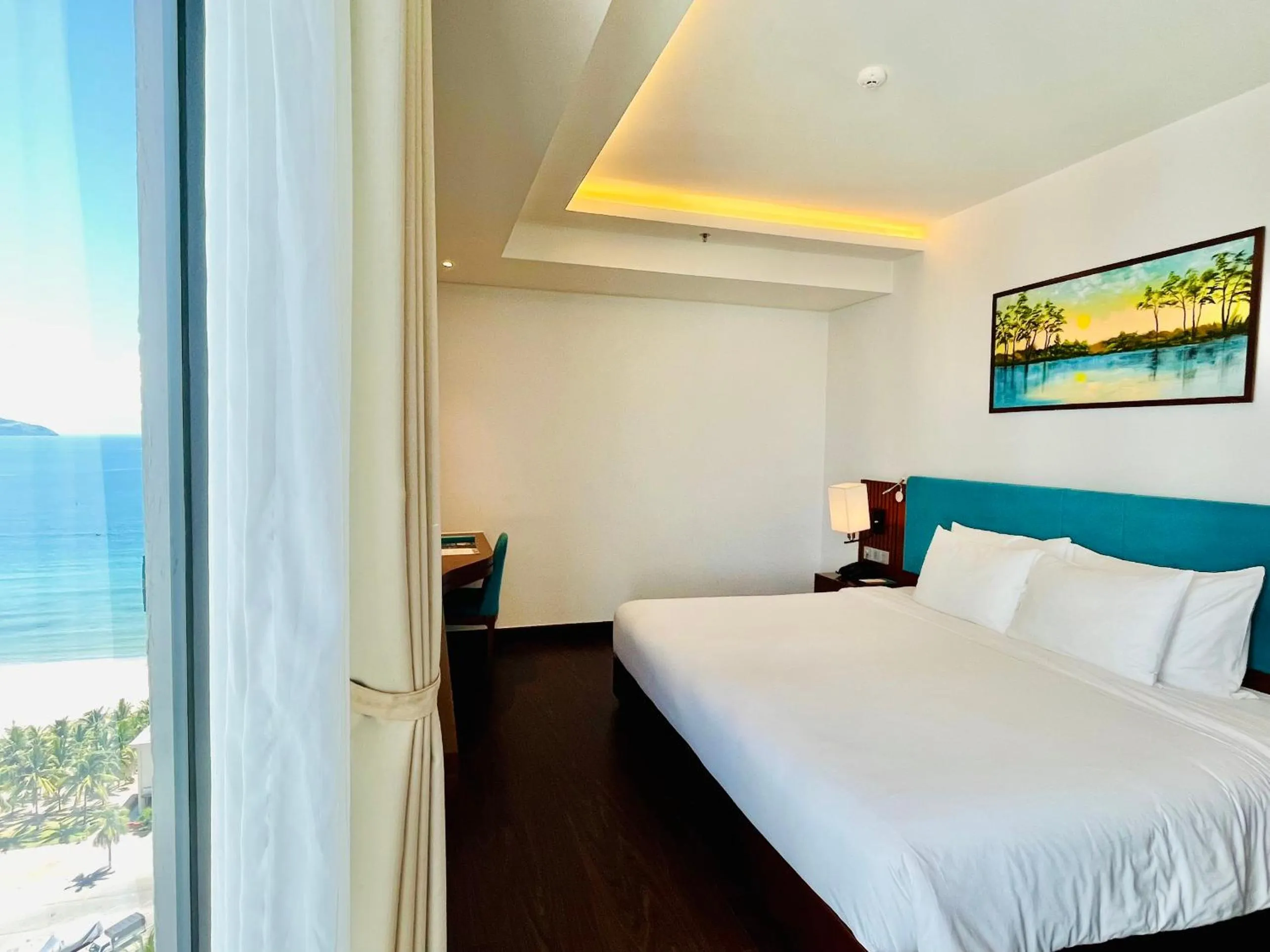 Deluxe Twin Room with Partial Sea View in Maximilan Danang Beach Hotel