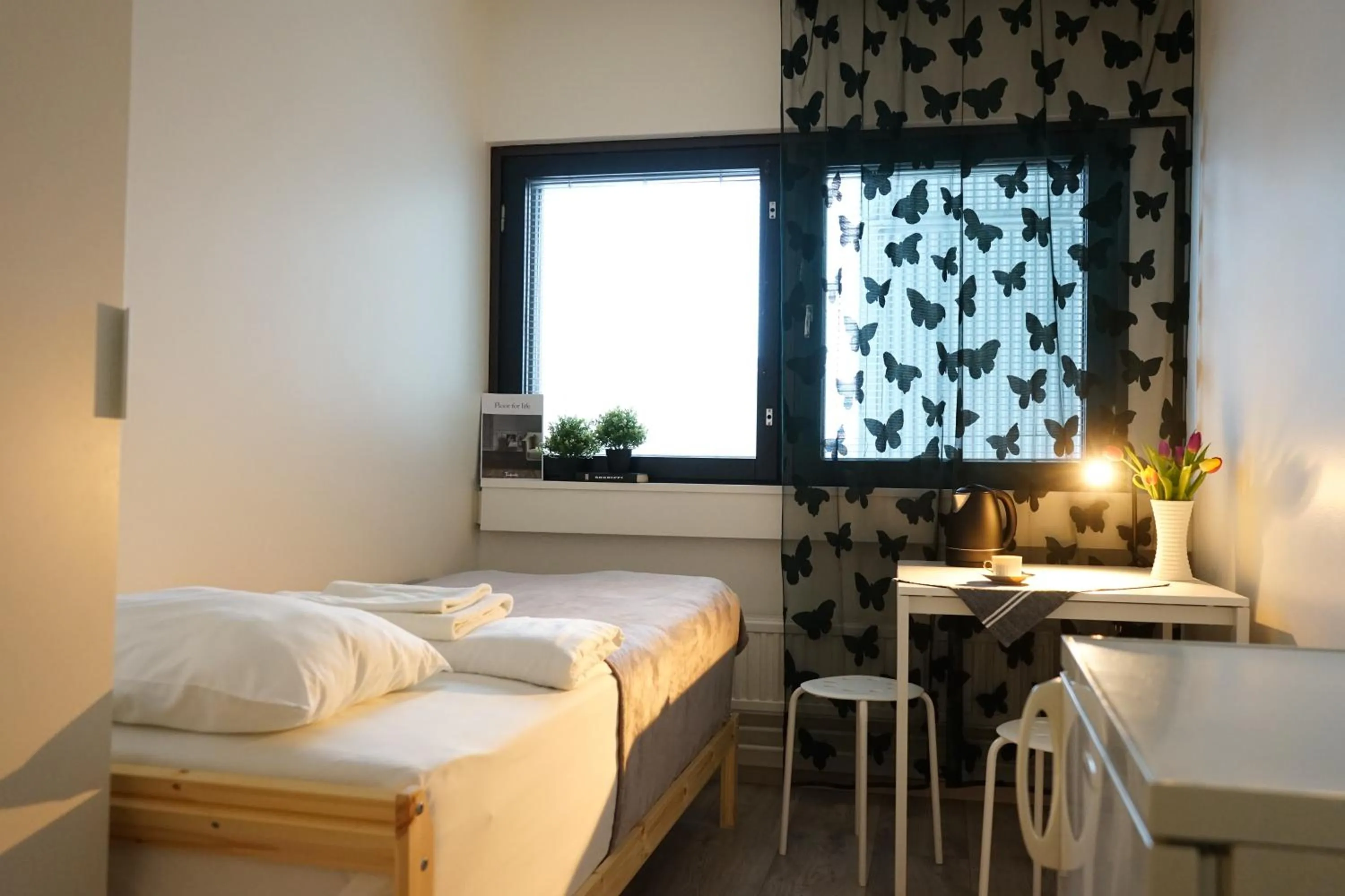 Budget Single Room with Shared Bathroom - single occupancy in Inn Tourist Hostel