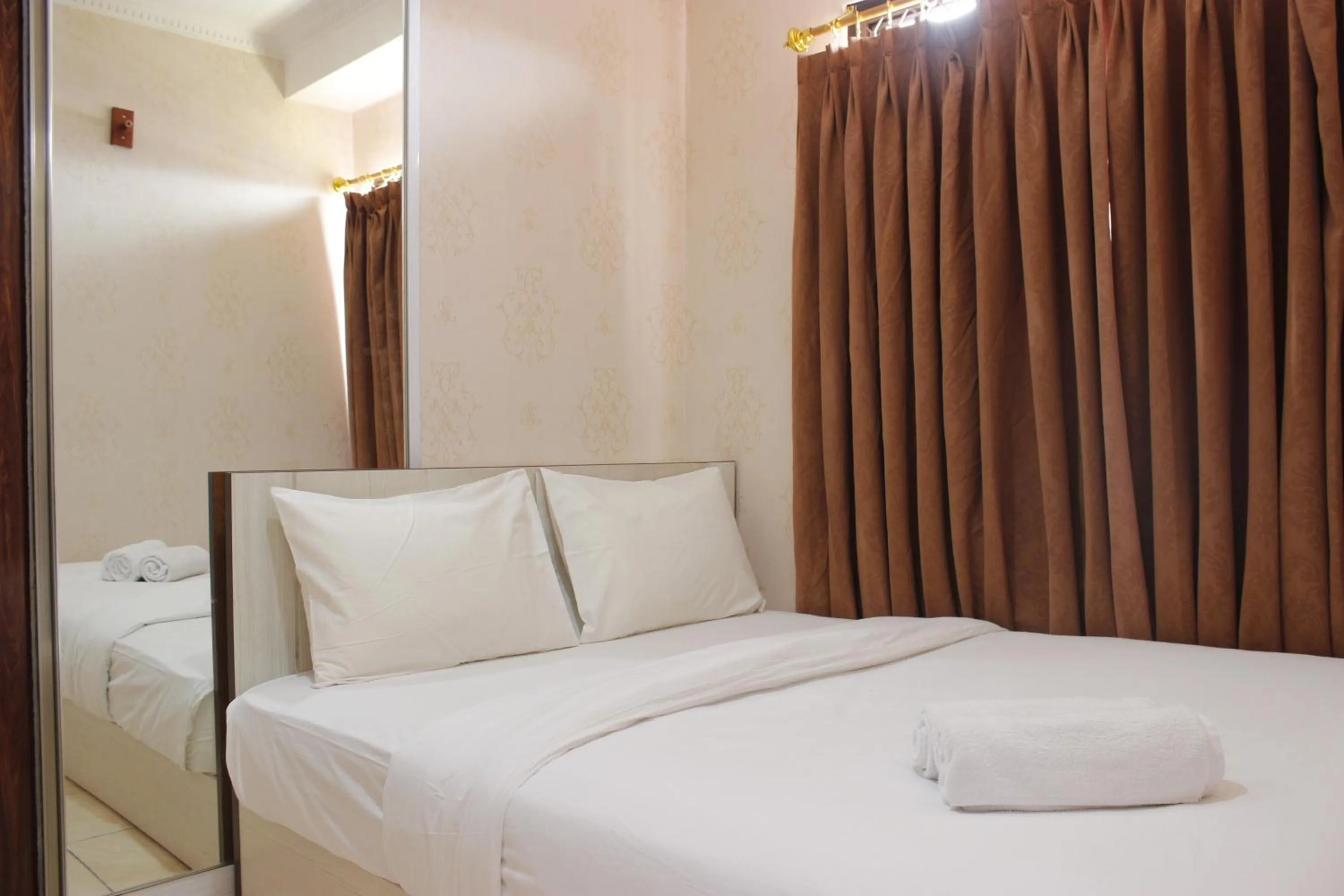 Cozy 2BR Tamansari Panoramic Apartment By Travelio