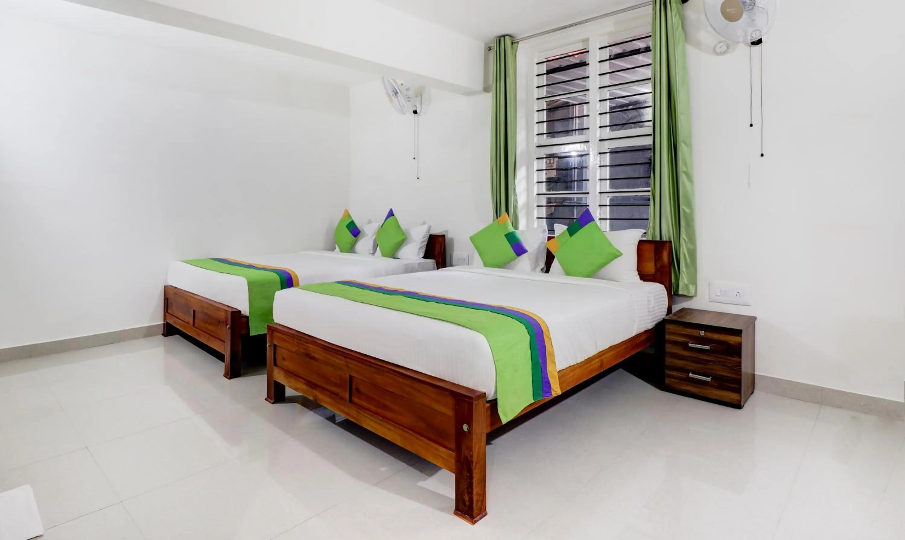Deluxe Room With Coffee Table - single occupancy in Treebo New Redfern, Madikeri