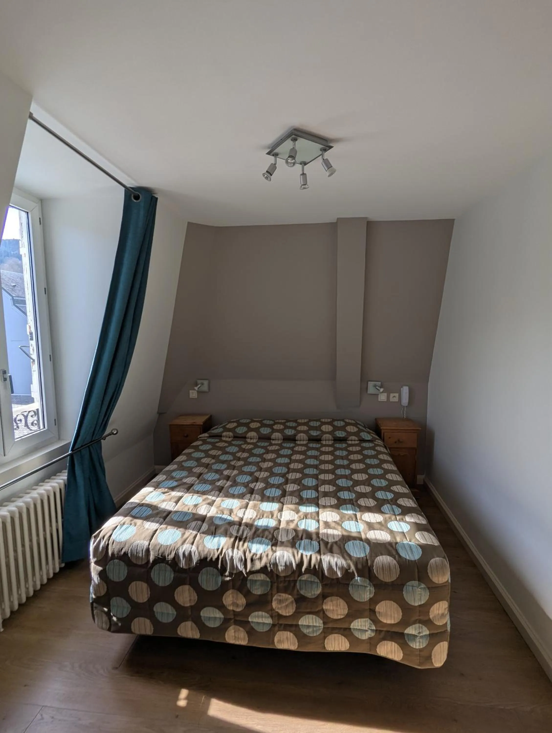 Quadruple Room in Logis Hôtel Regina