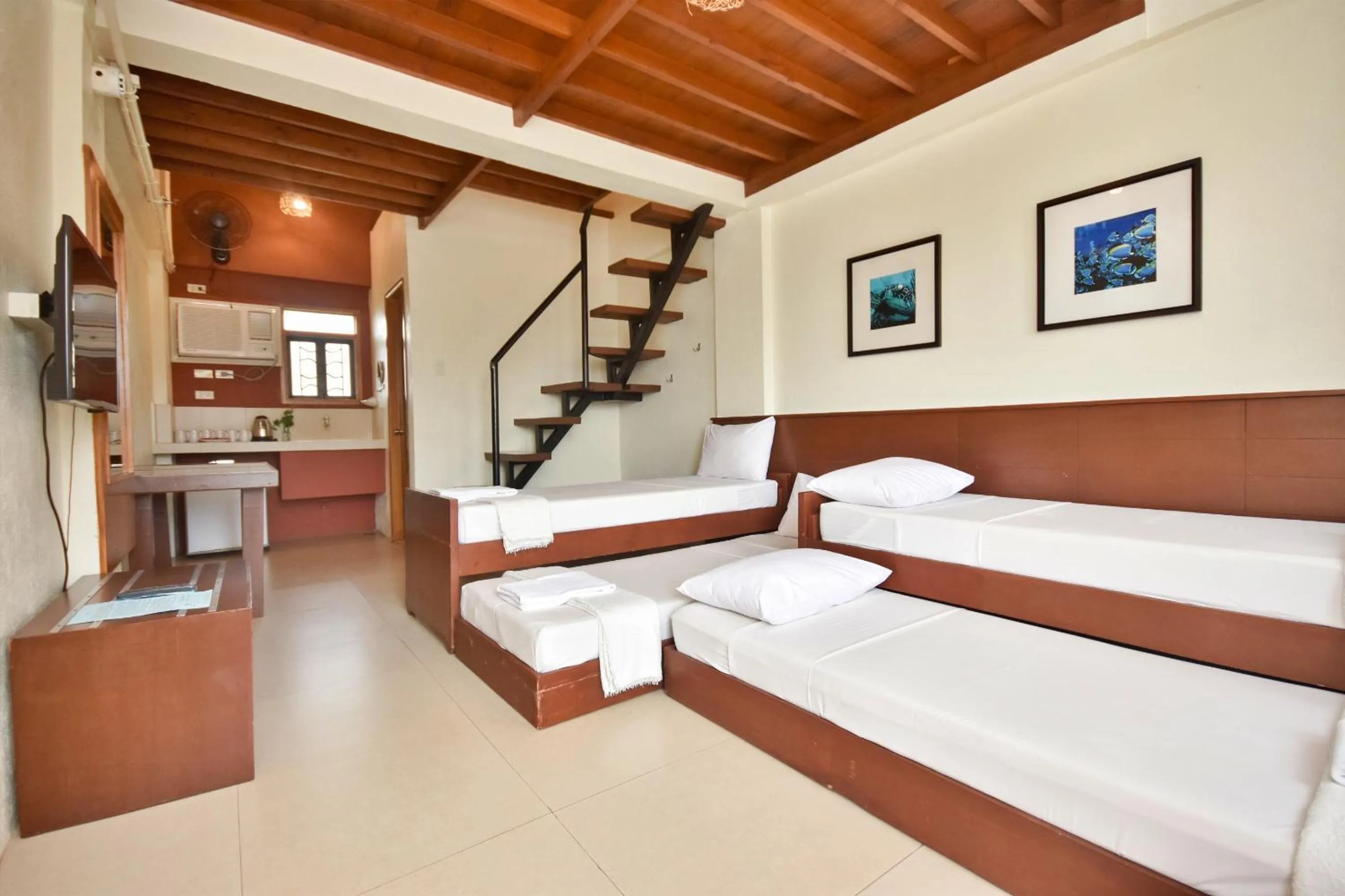 Family Room in Agos Boracay Rooms + Beds