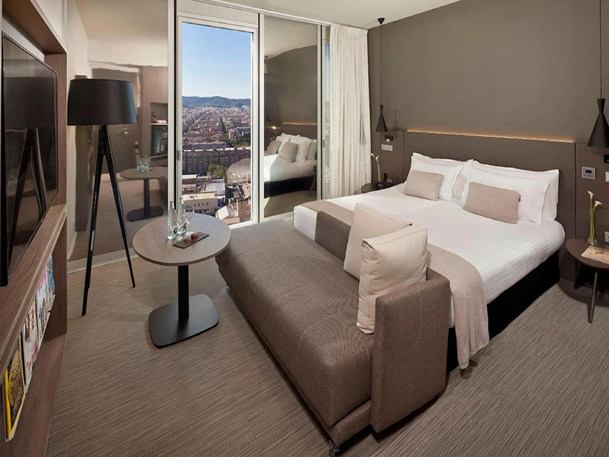 The Level Family Room with City View in The Level at Melia Barcelona Sky
