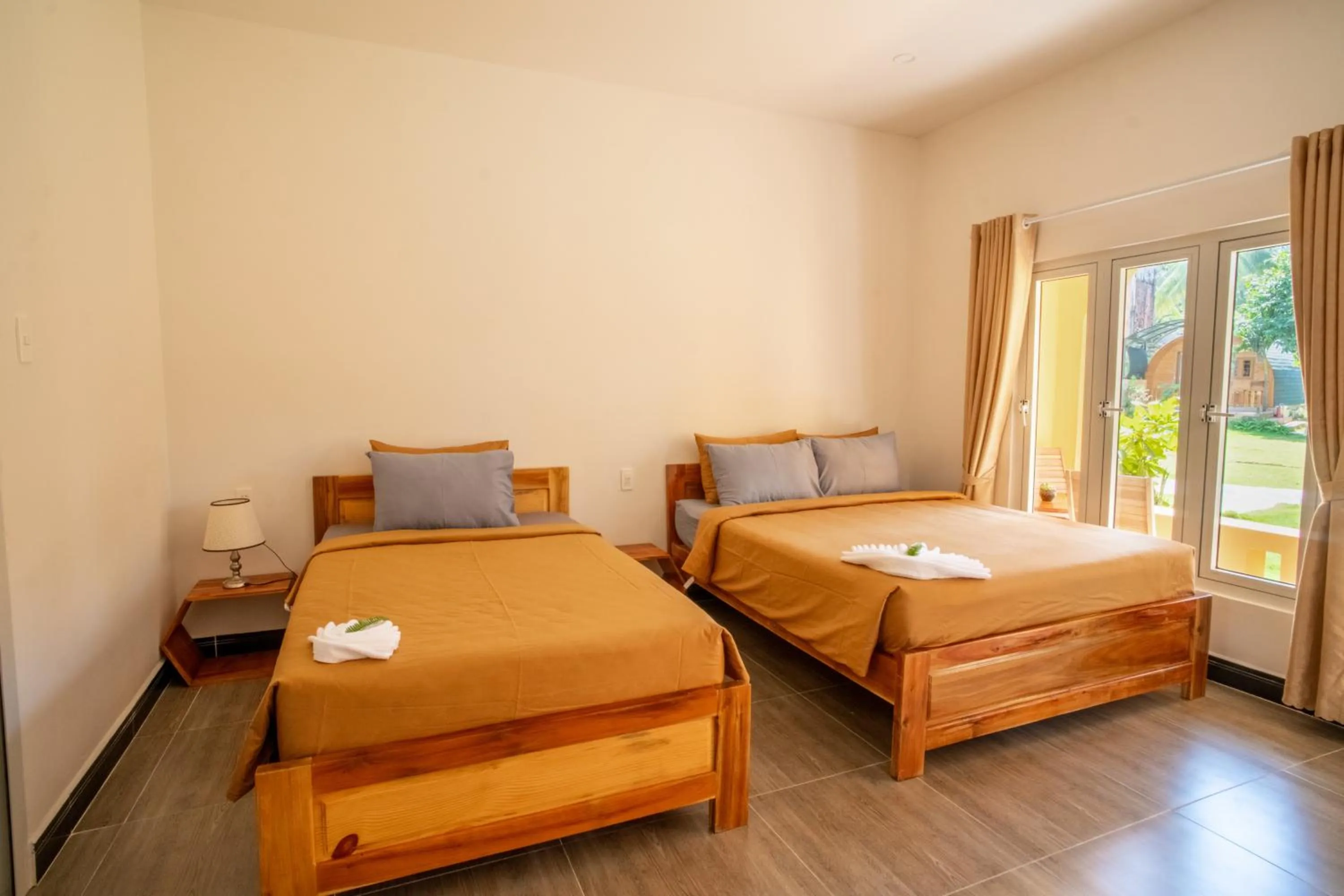 Triple Room with Garden View in Vida Loca Sunset Beach Resort