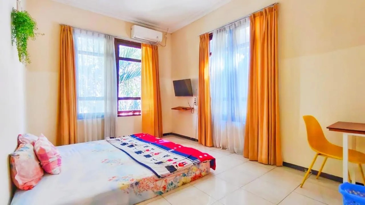 Triple Room in Green Surabaya Homey Syariah
