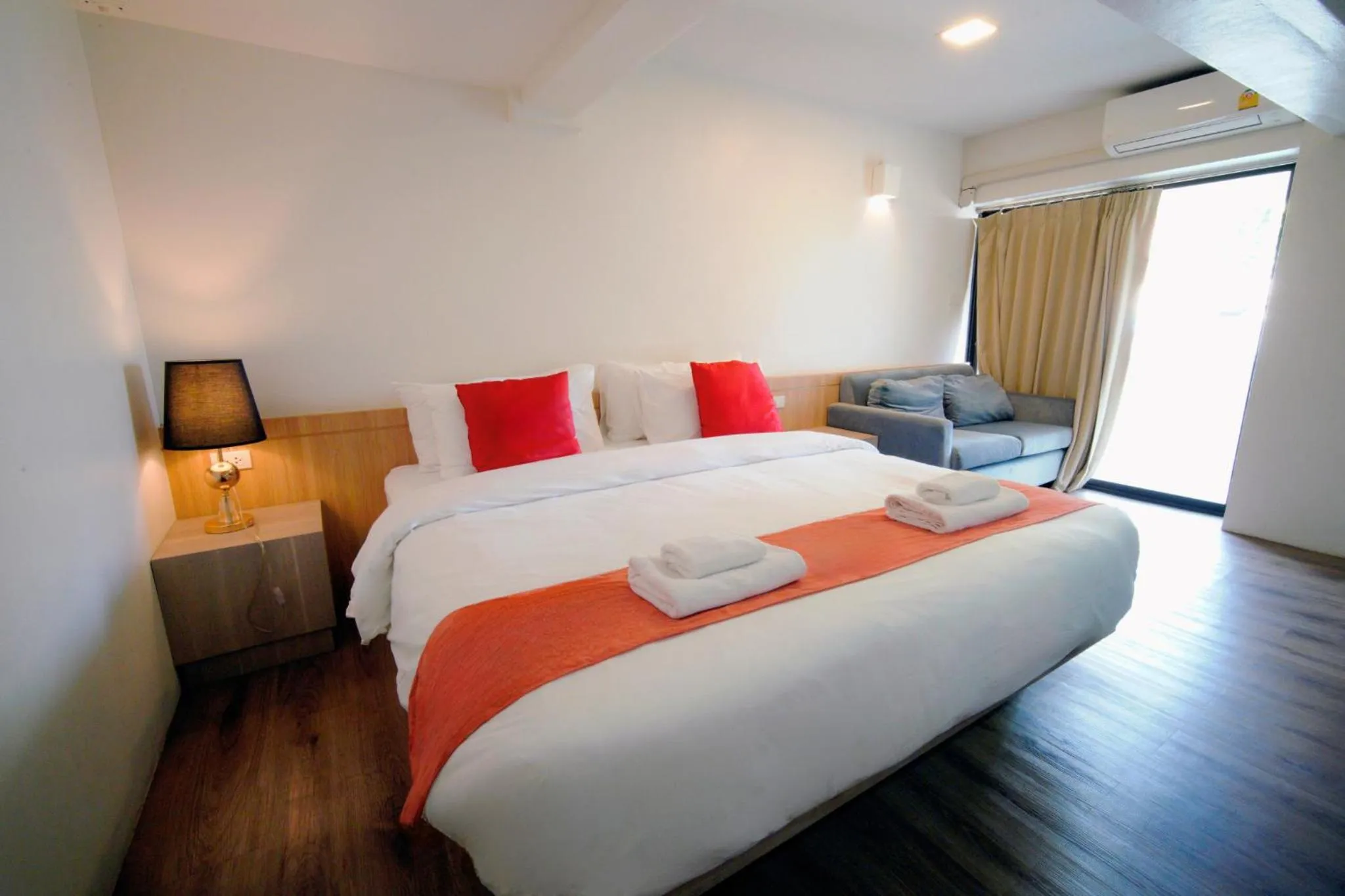 Deluxe Double Room with Balcony in Wild Orchid Villa Bangkok