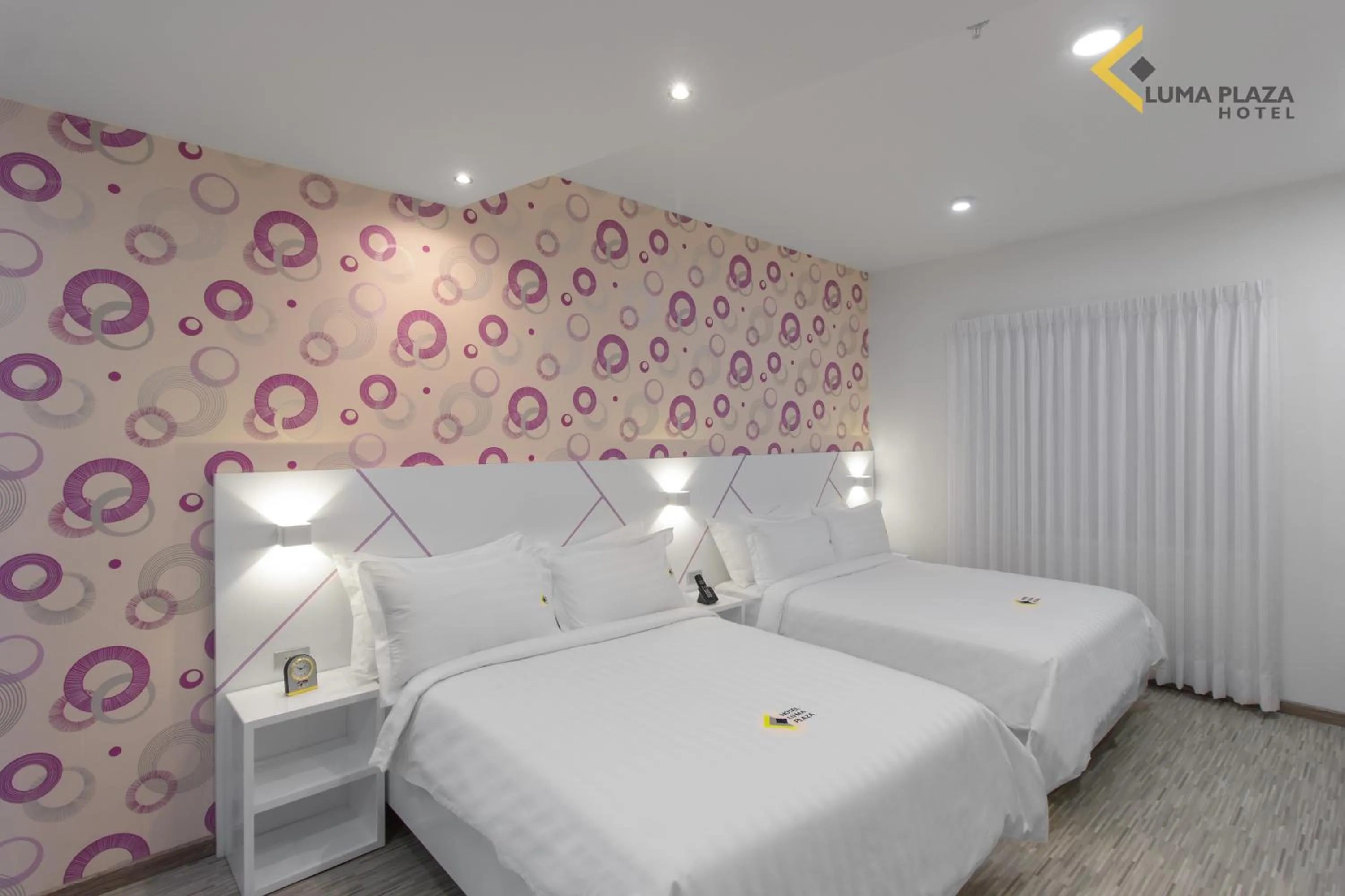 Standard Quadruple Room in Luma Plaza Hotel