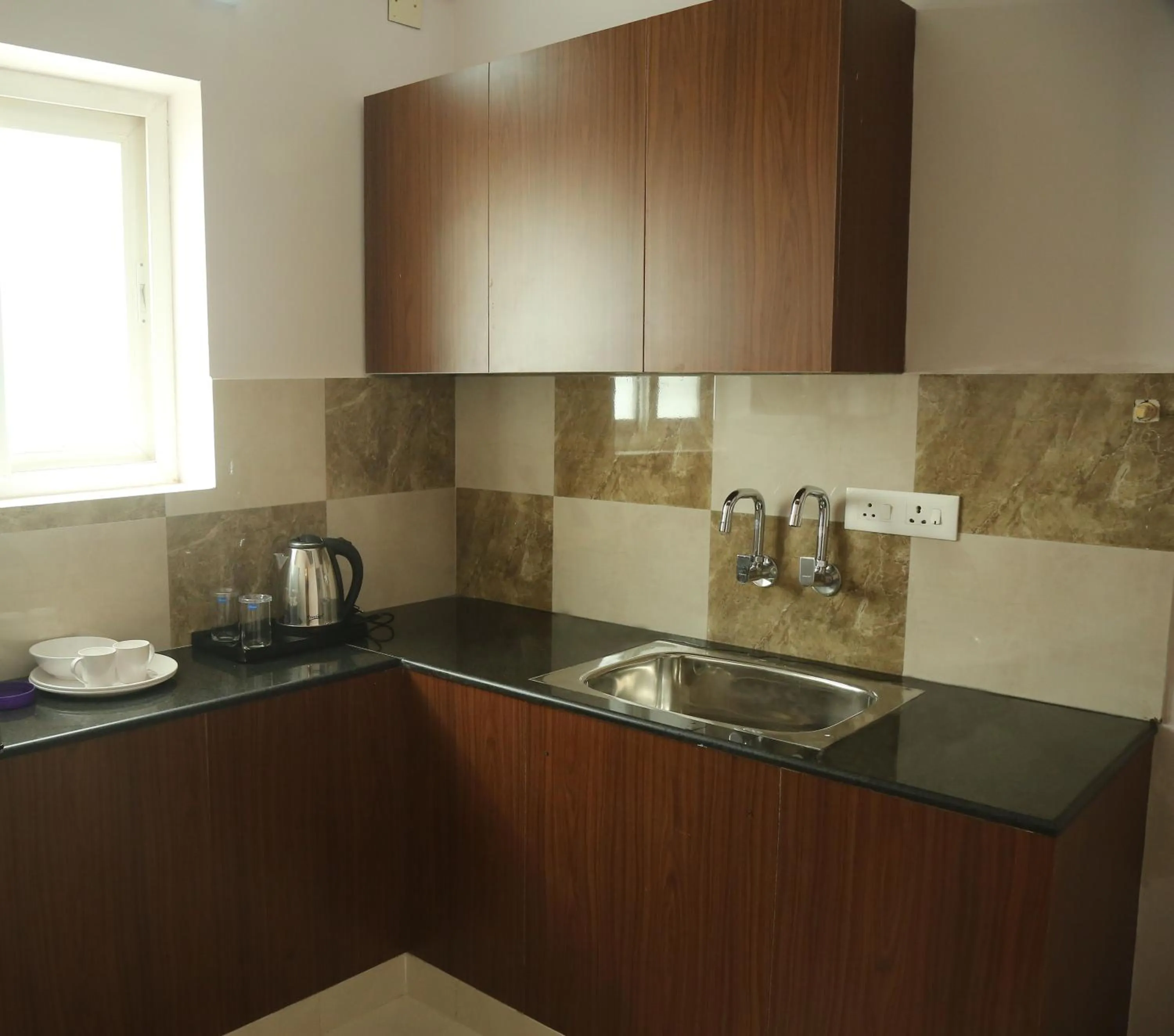 Standard Double Room - single occupancy in Kfour Apartment & Hotels Private Limited