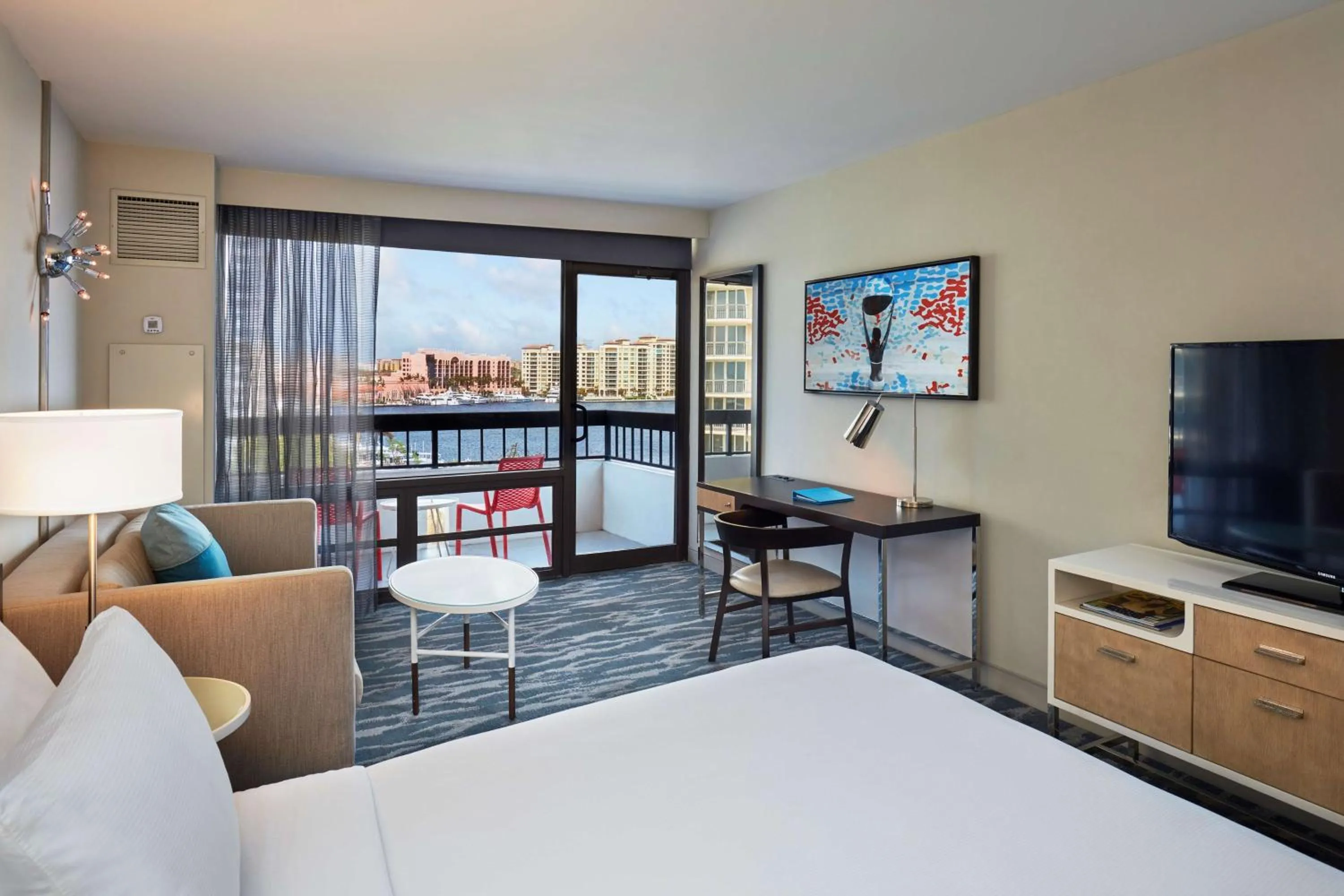King Room - Hearing Accessible with Balcony and Water View in Waterstone Resort & Marina Boca Raton, Curio Collection by Hilton