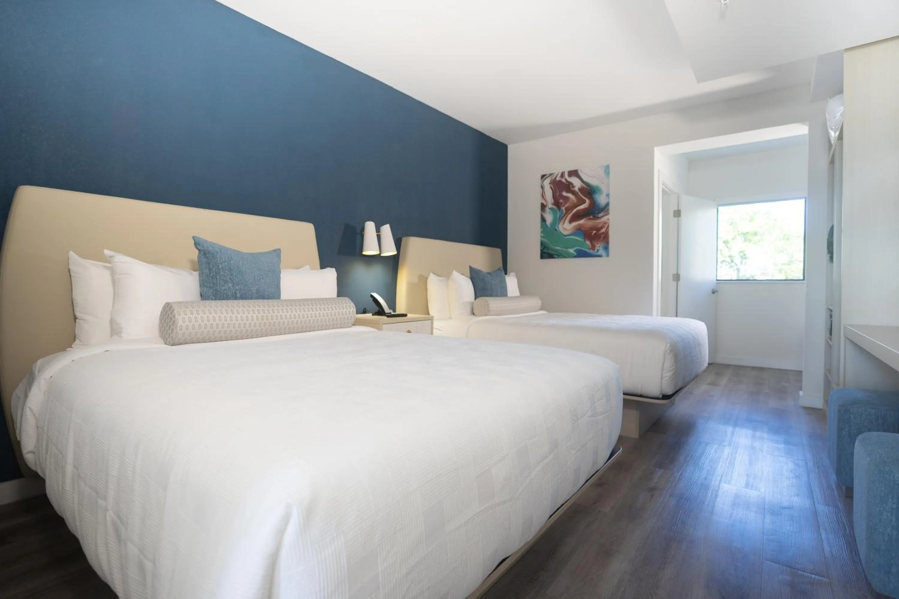 Queen Suite with Two Queen Beds and Pool View - Disability Access/Non Smoking in DASKK Orlando Hotel near Universal Blvd, an Ascend Collection Hotel
