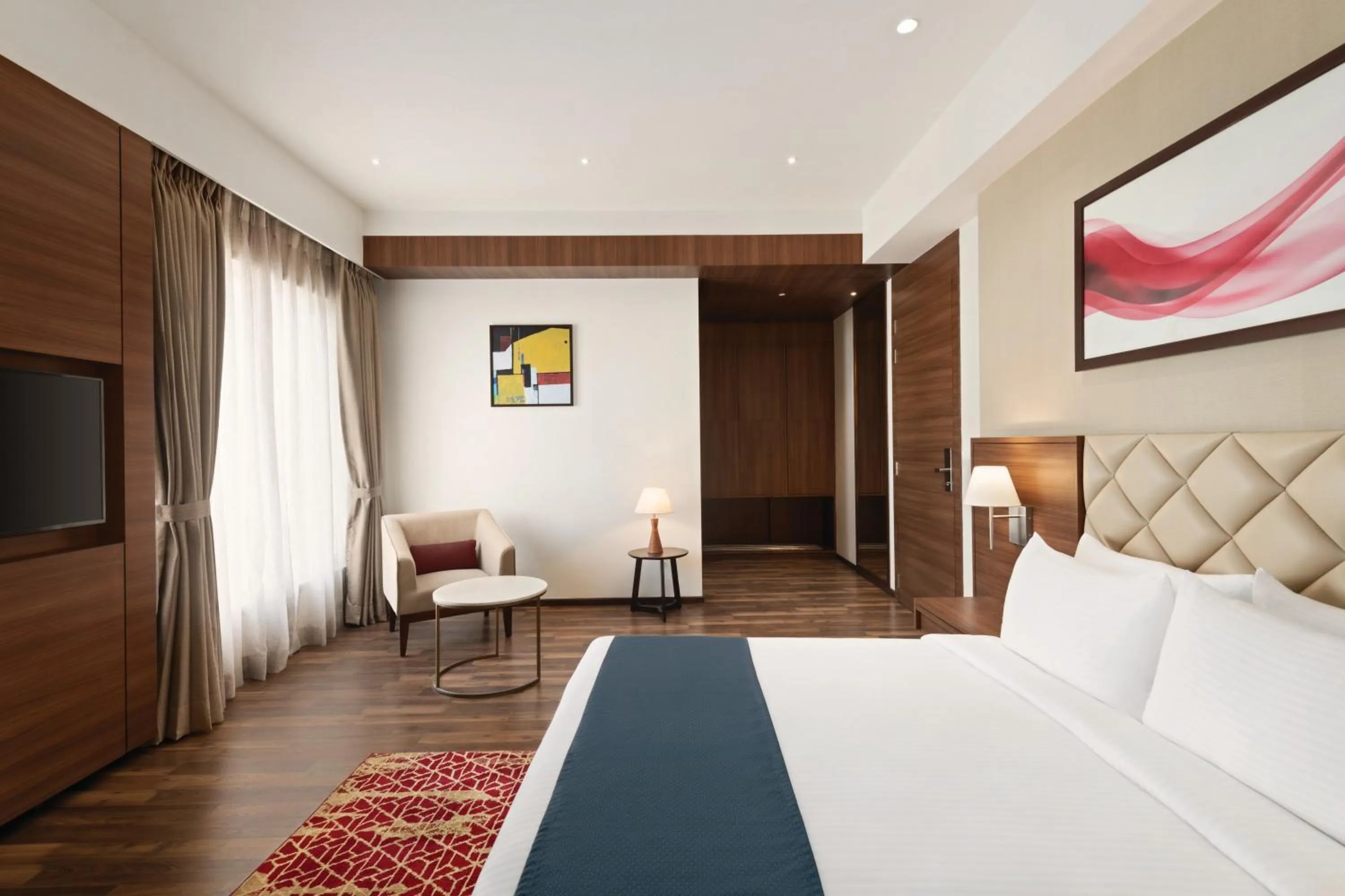 Deluxe Twin Room (Non-Smoking) - single occupancy - Book & Unlock Exclusive Discounts in Ramada by Wyndham Gandhidham Shinay
