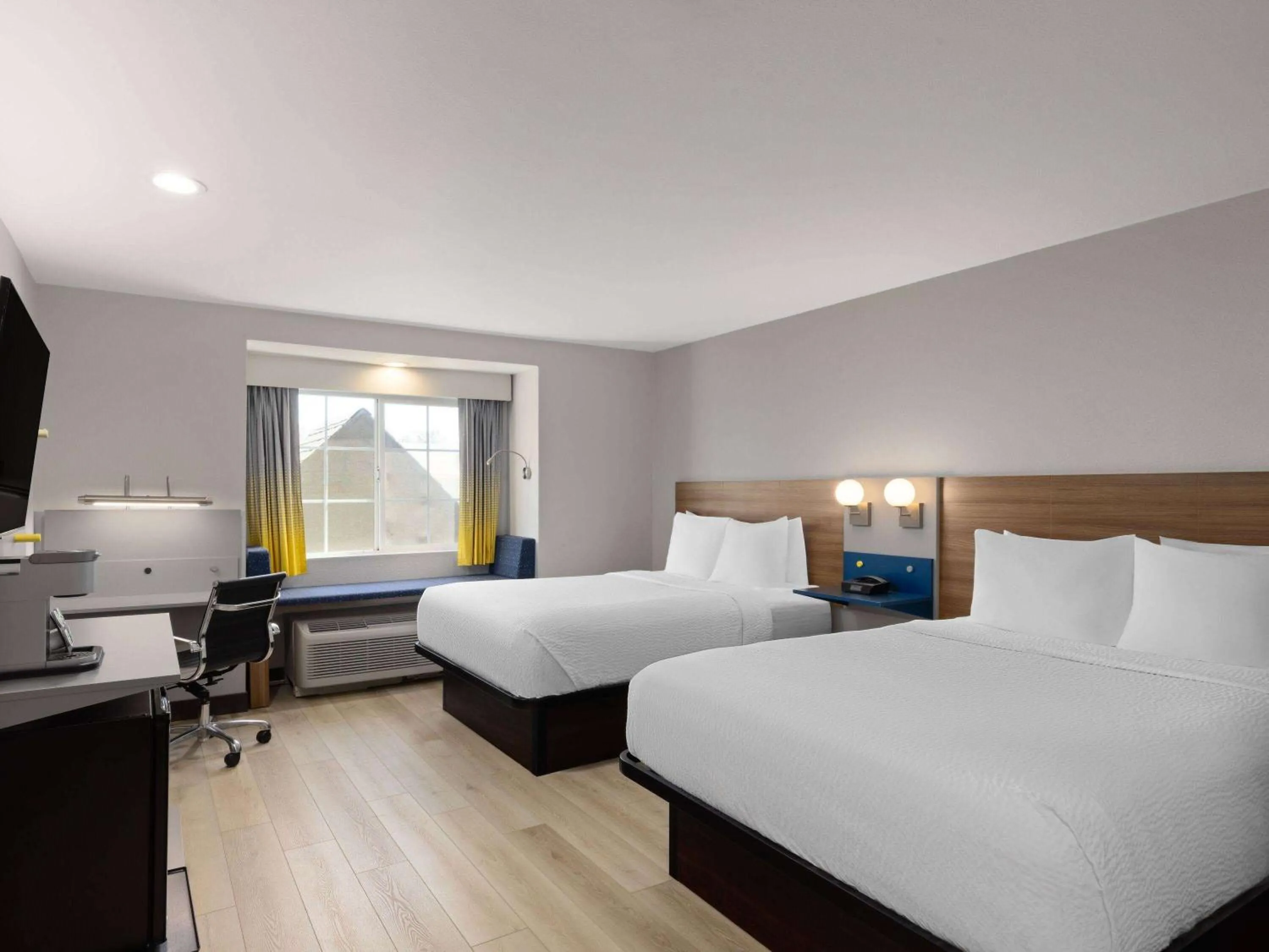 Queen Room with Two Queen Beds - Non-Smoking in Microtel Inn & Suites by Wyndham Tracy