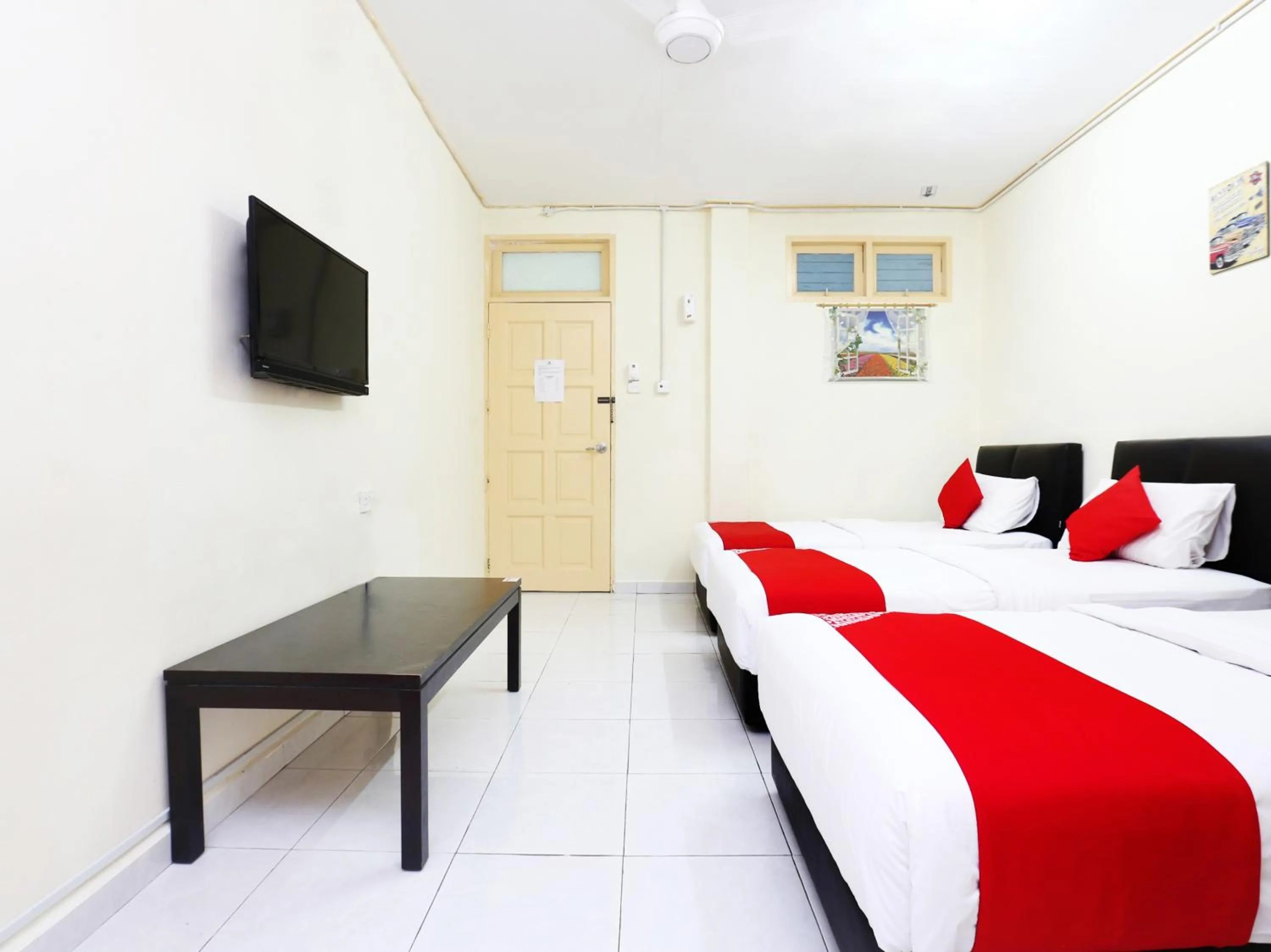 Standard Triple Room in Hotel O Pelangi Marang