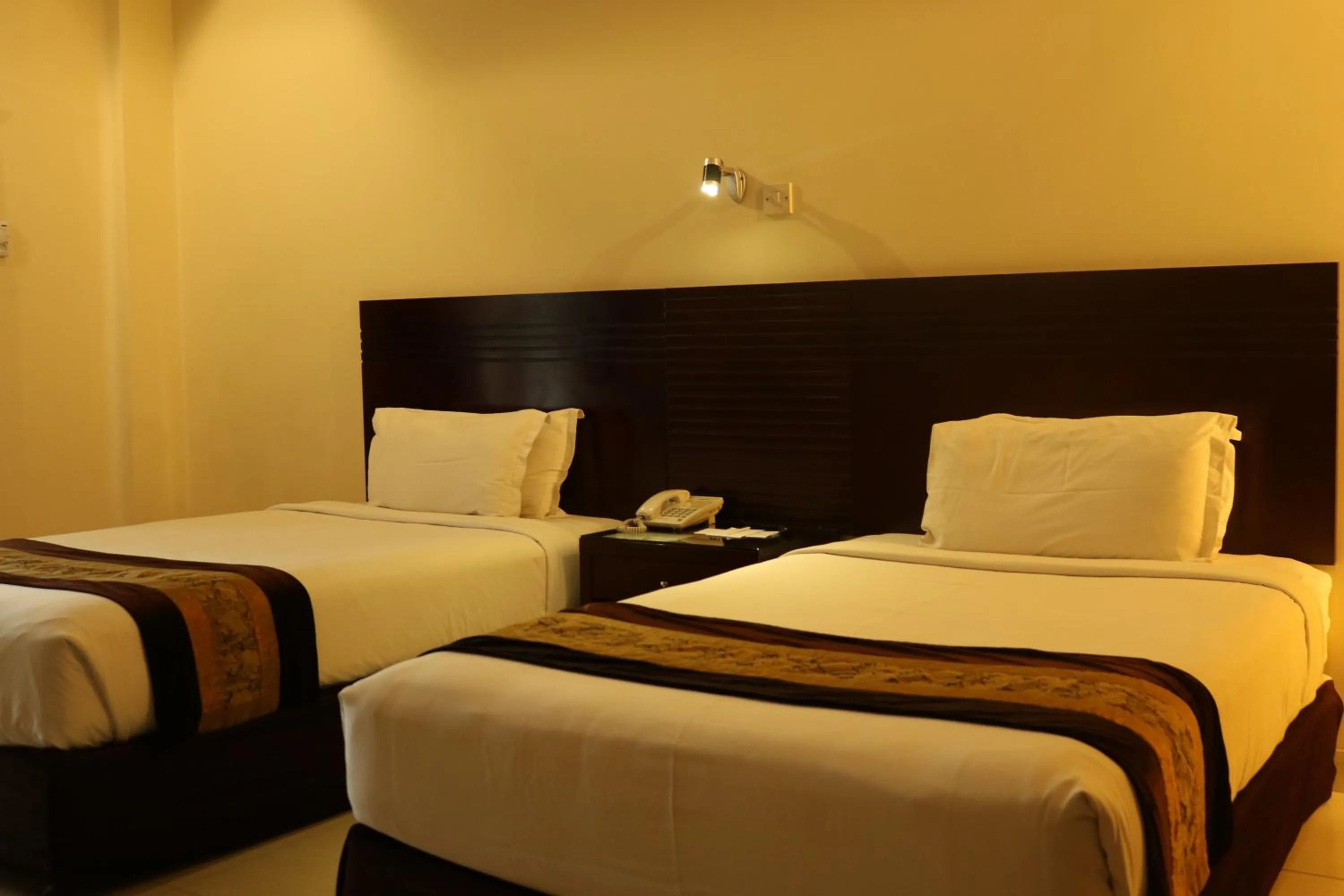Deluxe Twin Room in The Avenue Hotel & Suites