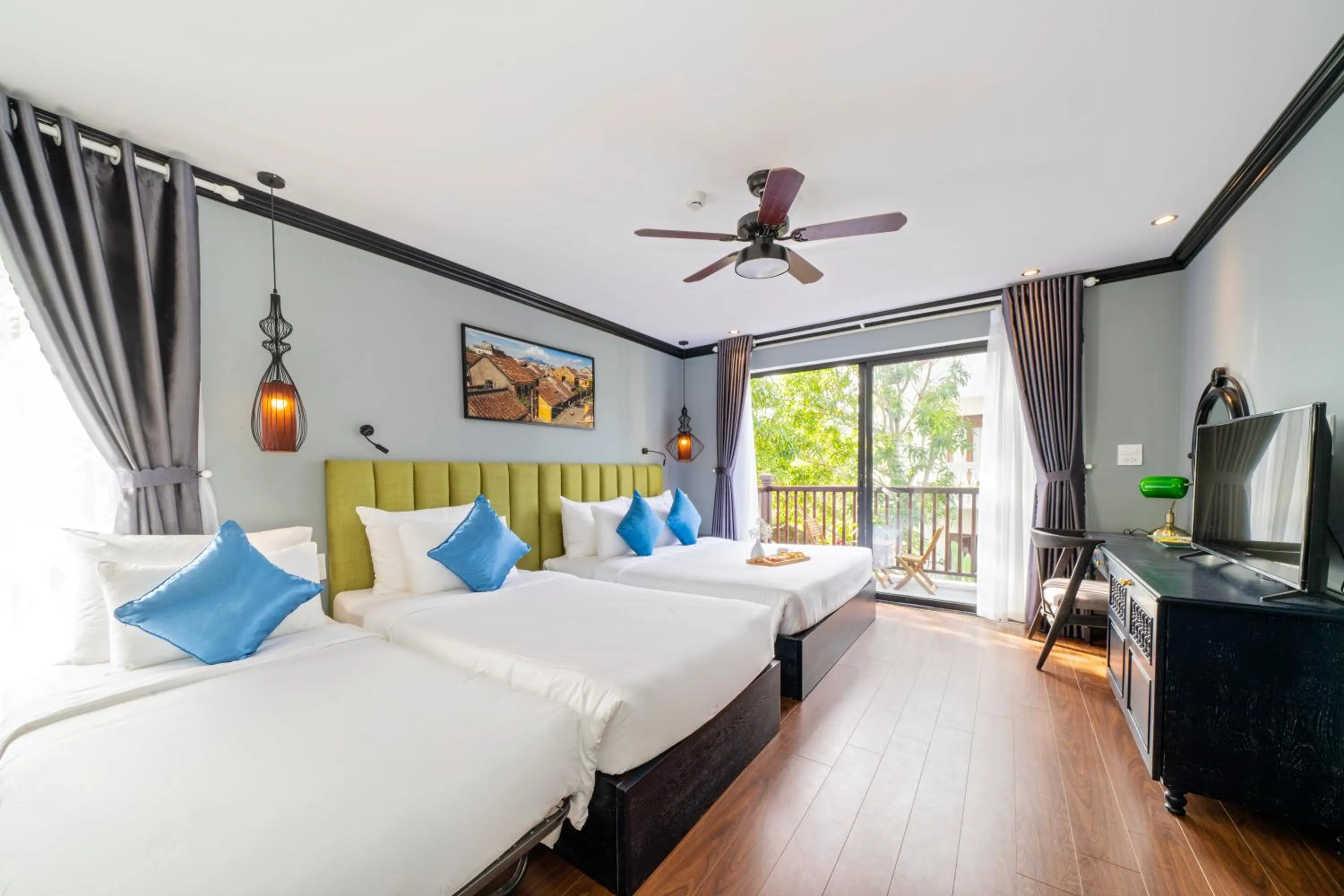 Triple Room with Balcony in Daisy An Bang Villa