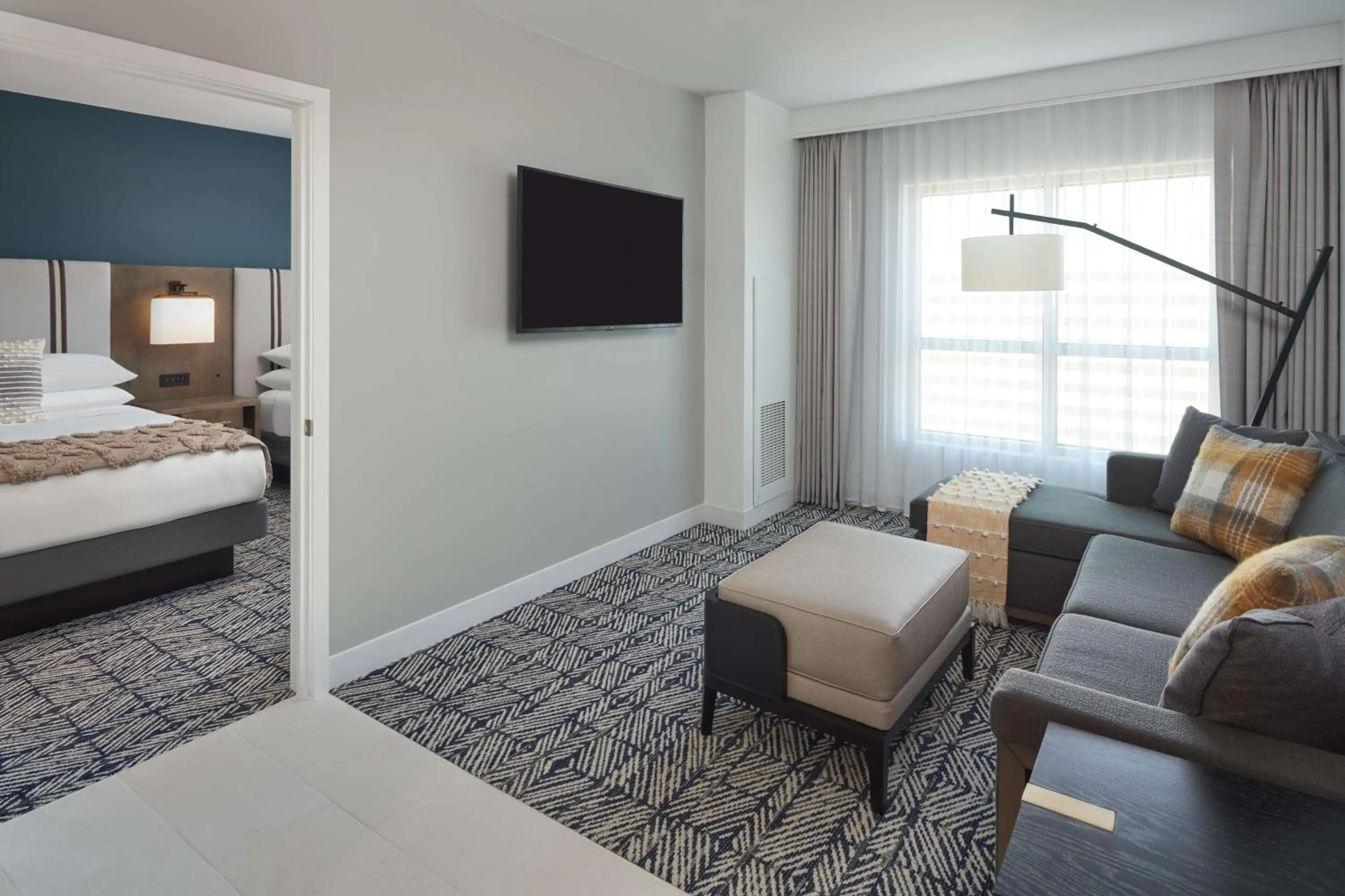 Two-Room Suite with Two Queen Beds - Hearing Accessible in The Chifley Houston, Tapestry Collection by Hilton