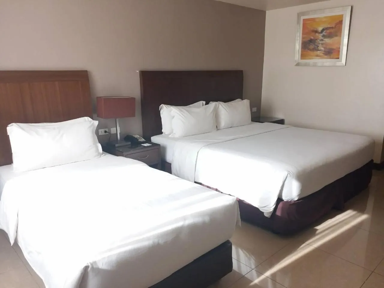 Deluxe Triple Room in Mandarin Plaza Hotel