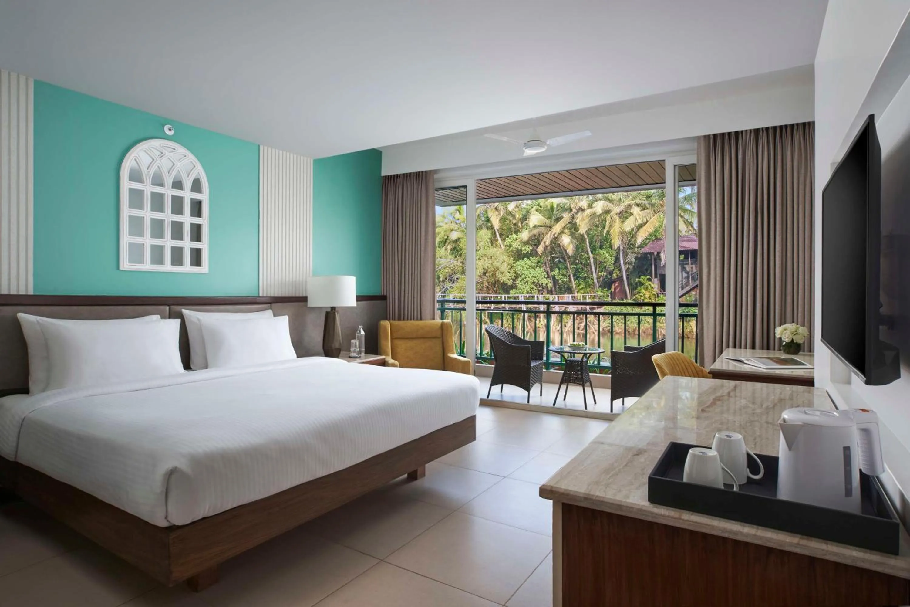 Deluxe Room with River View & Balcony - 1 child below 12 stays for free (upto 31st March 2026 check-in) + Beer on arrival + Happy Hours (6-8PM) in Mandrem Beach Resort, a member of Radisson Individuals Retreat