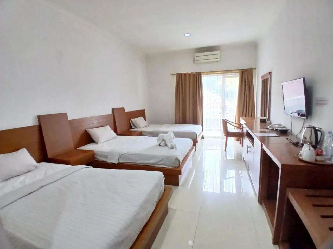 Standard Triple Room in HOTEL & WISMA BINTANG JADAYAT