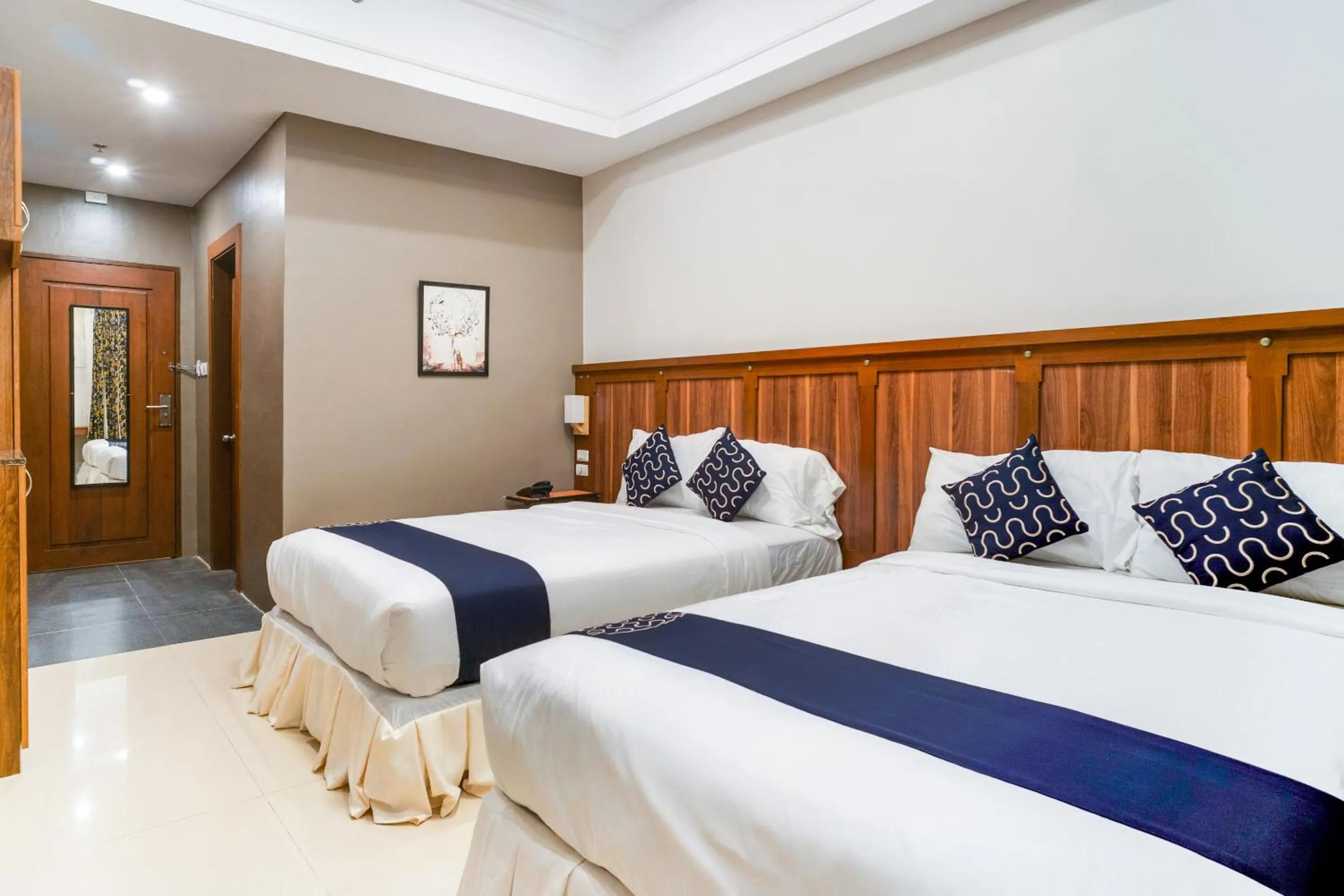 Standard Triple Room in Capital O 460 World Palace Hotel