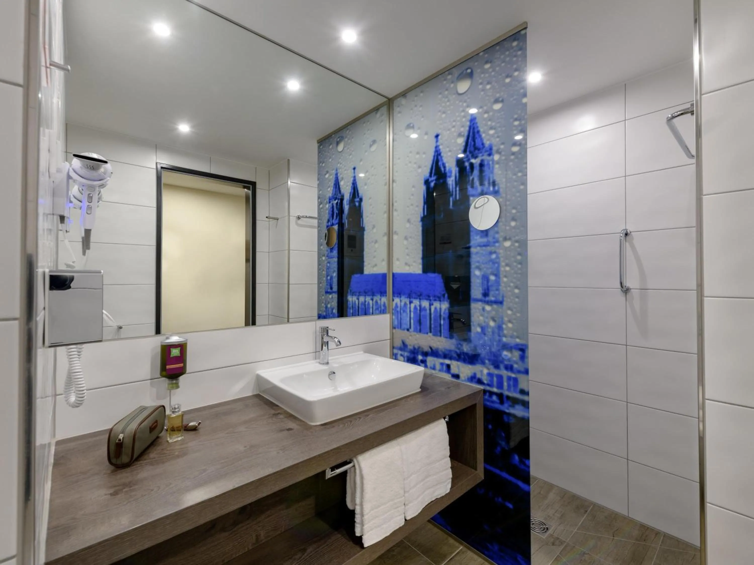 Family Room with double bed and sofa bed in ibis Styles Magdeburg