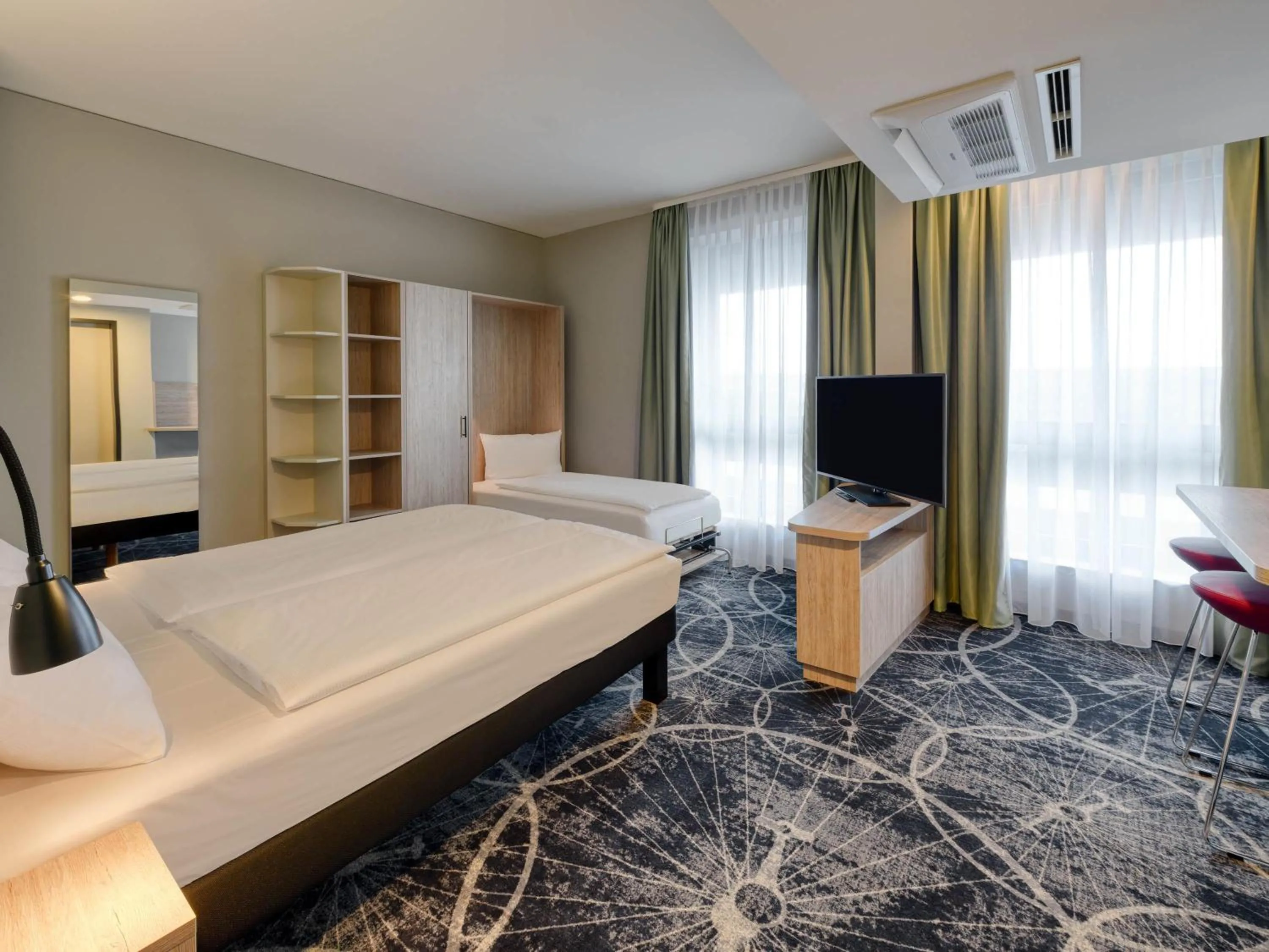 Modern Family Room in ibis Styles Magdeburg