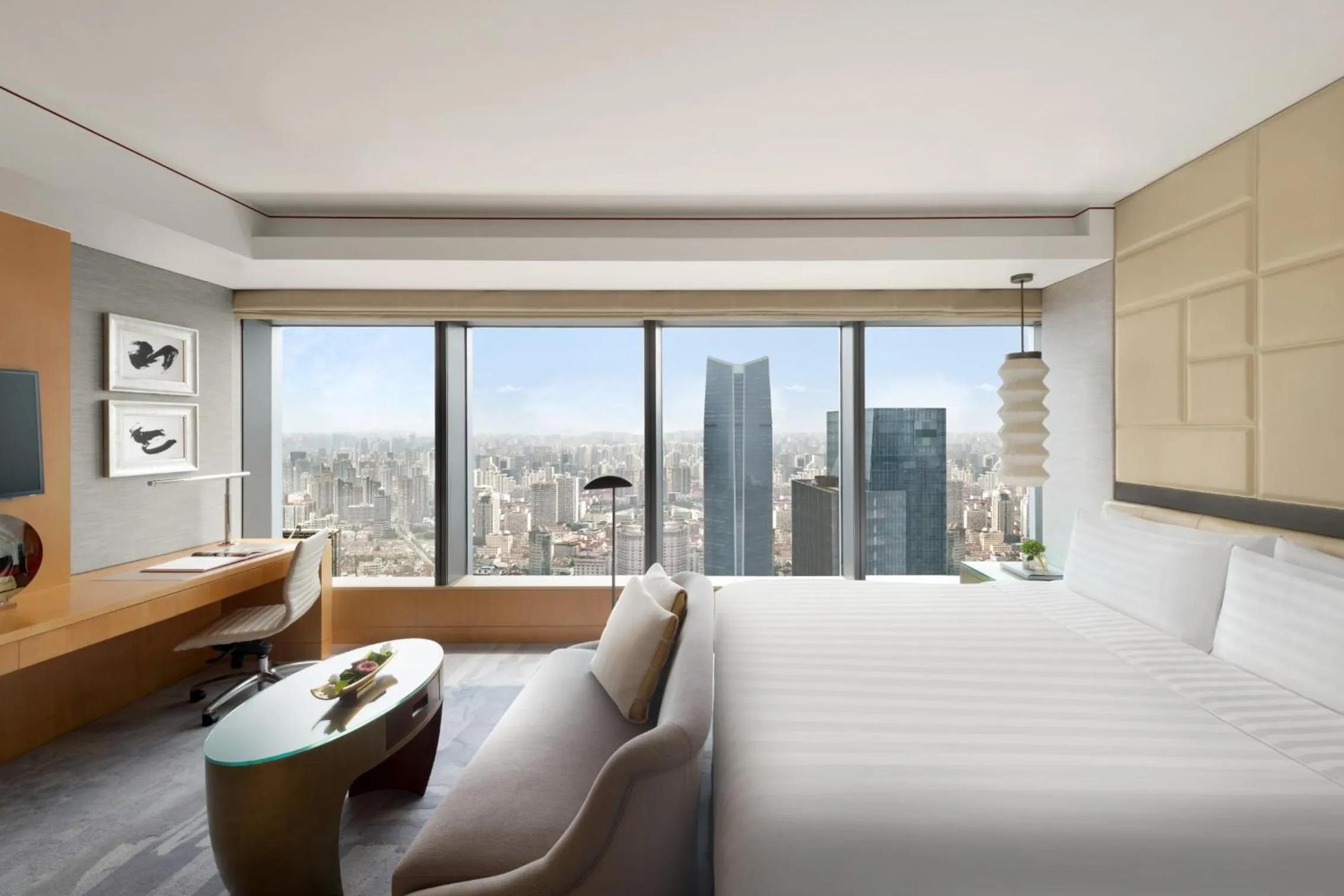 Deluxe King  in Jing An Shangri-La, Shanghai - sits centrally amid Puxi's iconic landmarks, uniquely positioned nearby Jing'an Temple