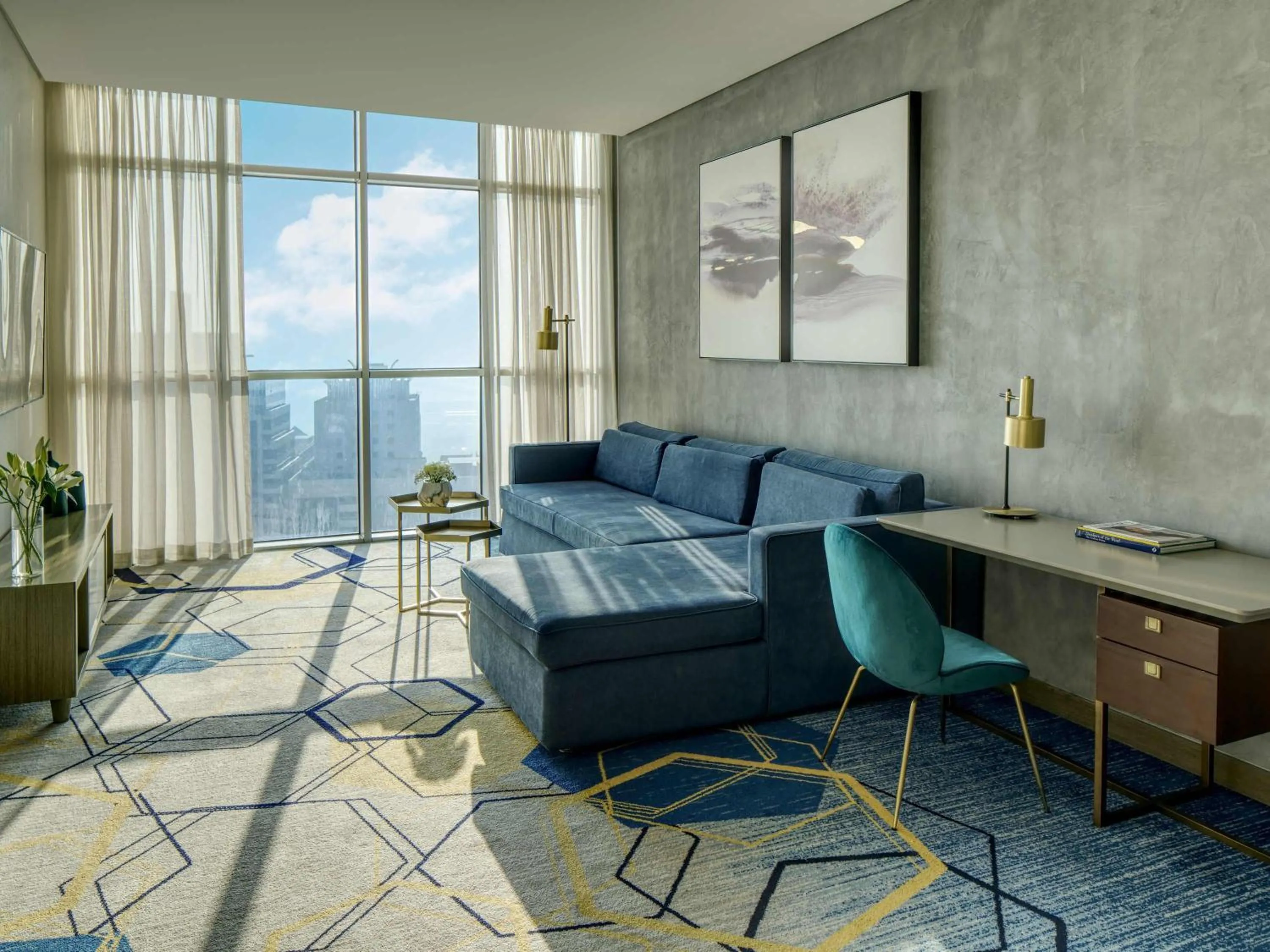 Deluxe King Suite with Lagoon View in Pullman Sharjah