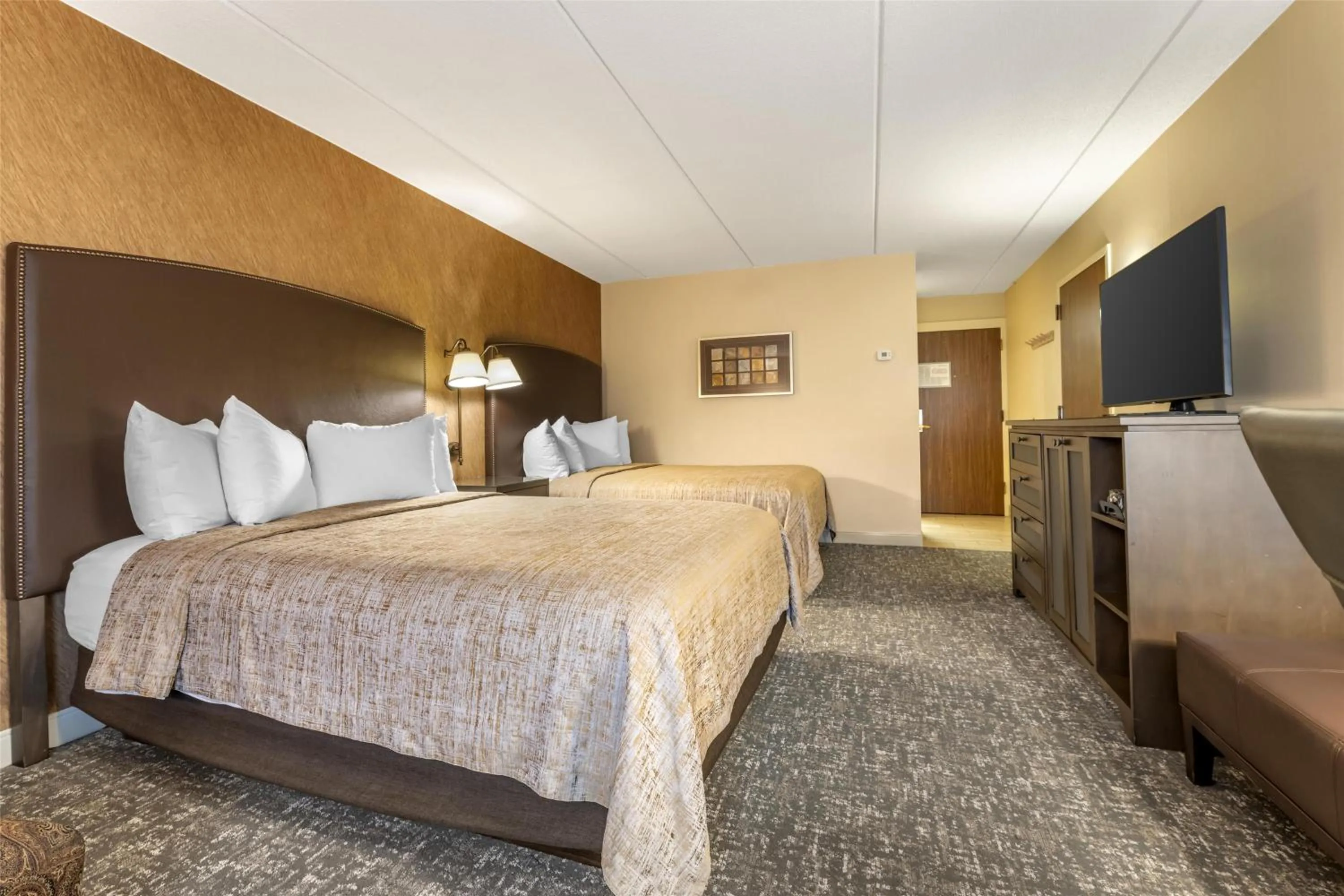 Deluxe Queen Room with Two Queen Beds with Pool Access - Non-smoking in Best Western Plus The Normandy Inn & Suites