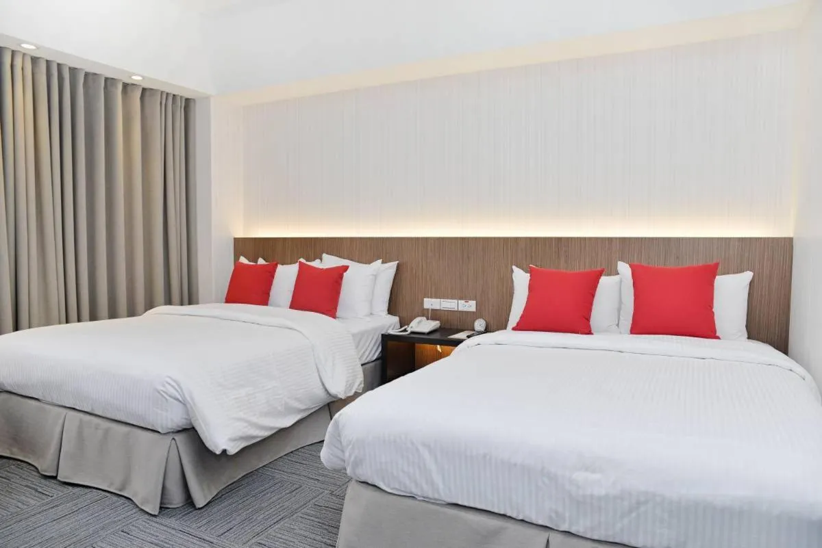 Deluxe Quadruple Room in Emperor Hotel