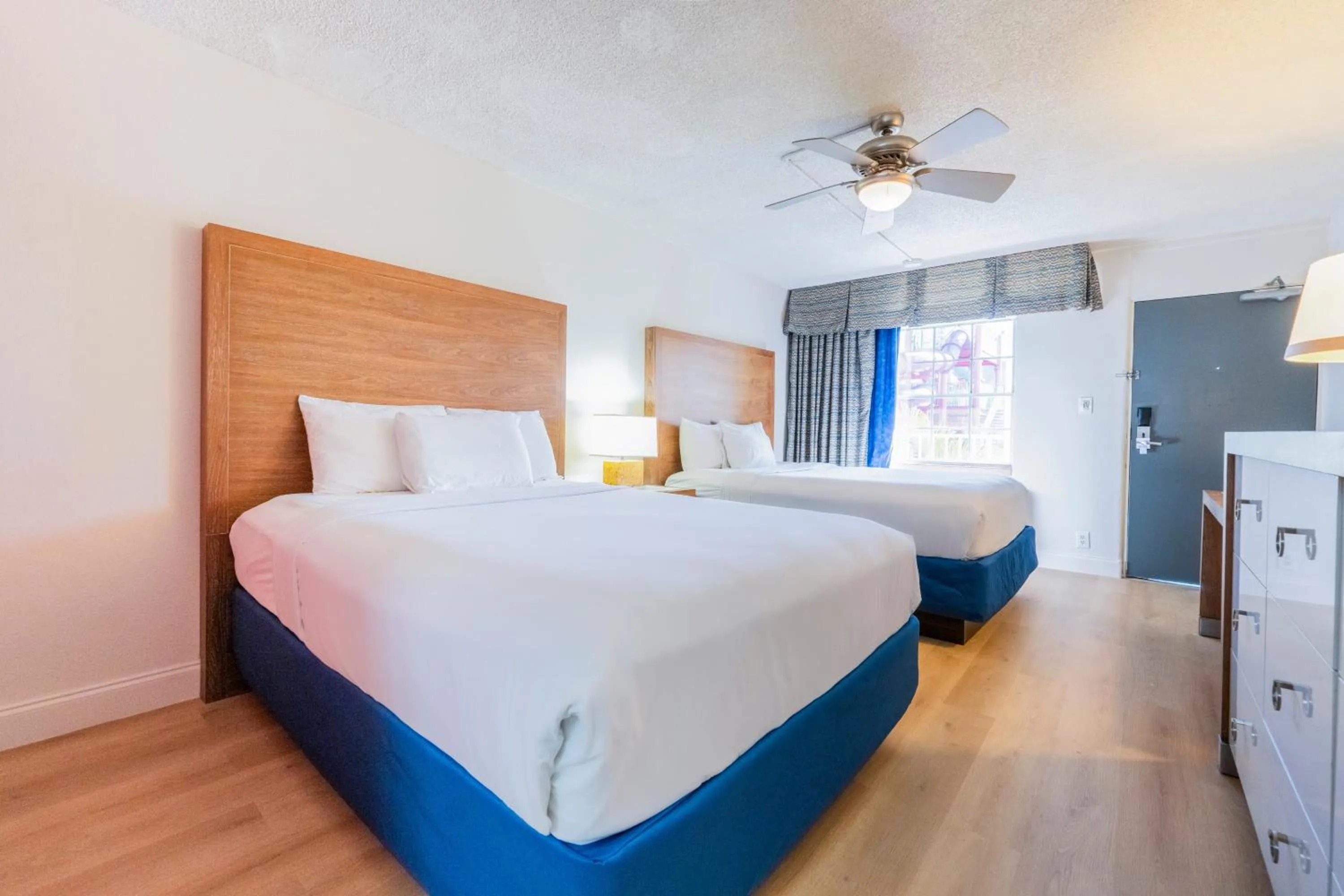 Room with Two Queen Beds and Mobility/Hearing Access and Roll-In Shower, Non-Smoking in Ramada by Wyndham Flamingo Water Park