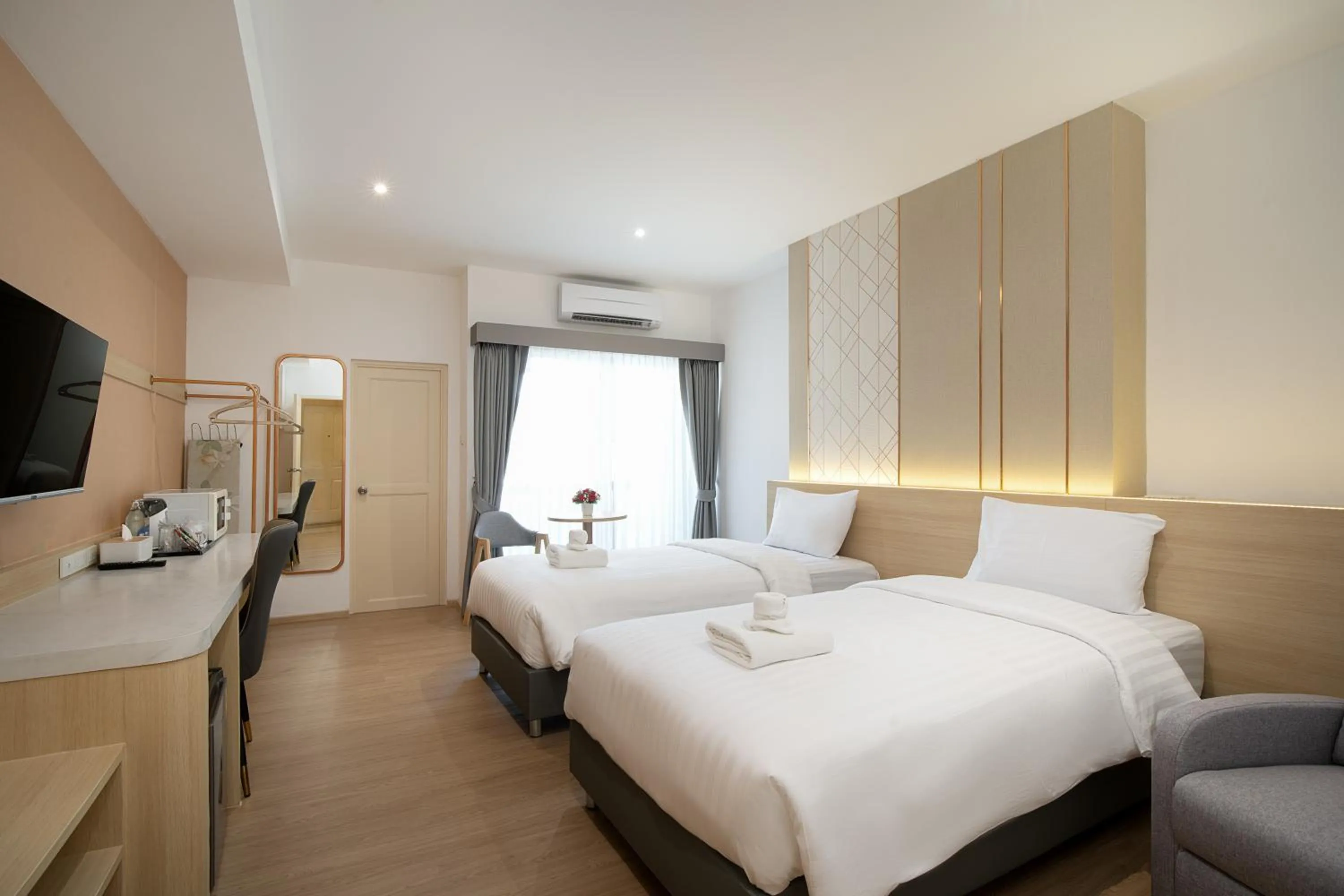 Deluxe Twin Room in Riski Residence Ngamwongwan