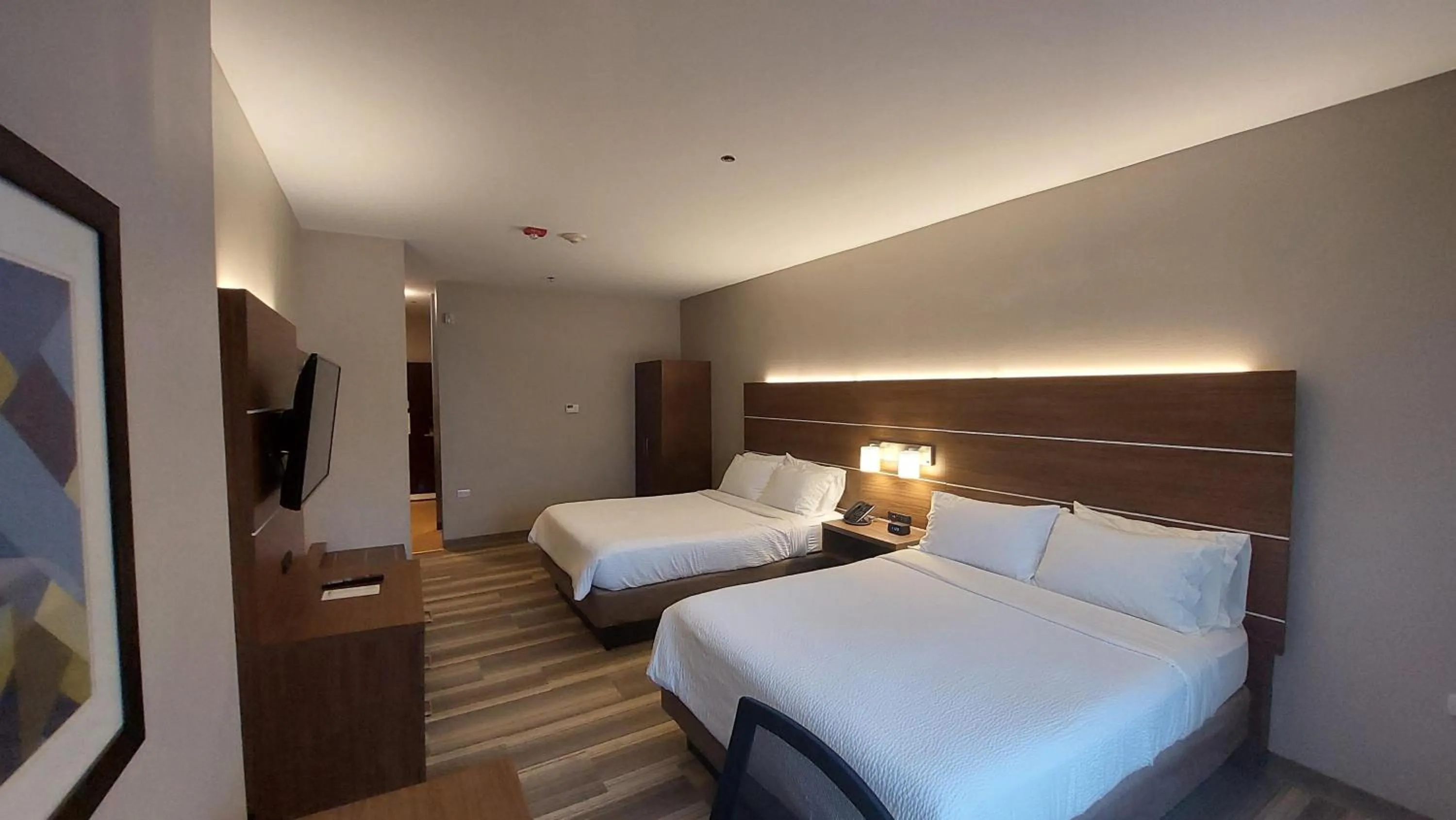 Queen Room with Two Queen Beds - Hearing Accessible/Non-Smoking in Holiday Inn Express Trincity by IHG